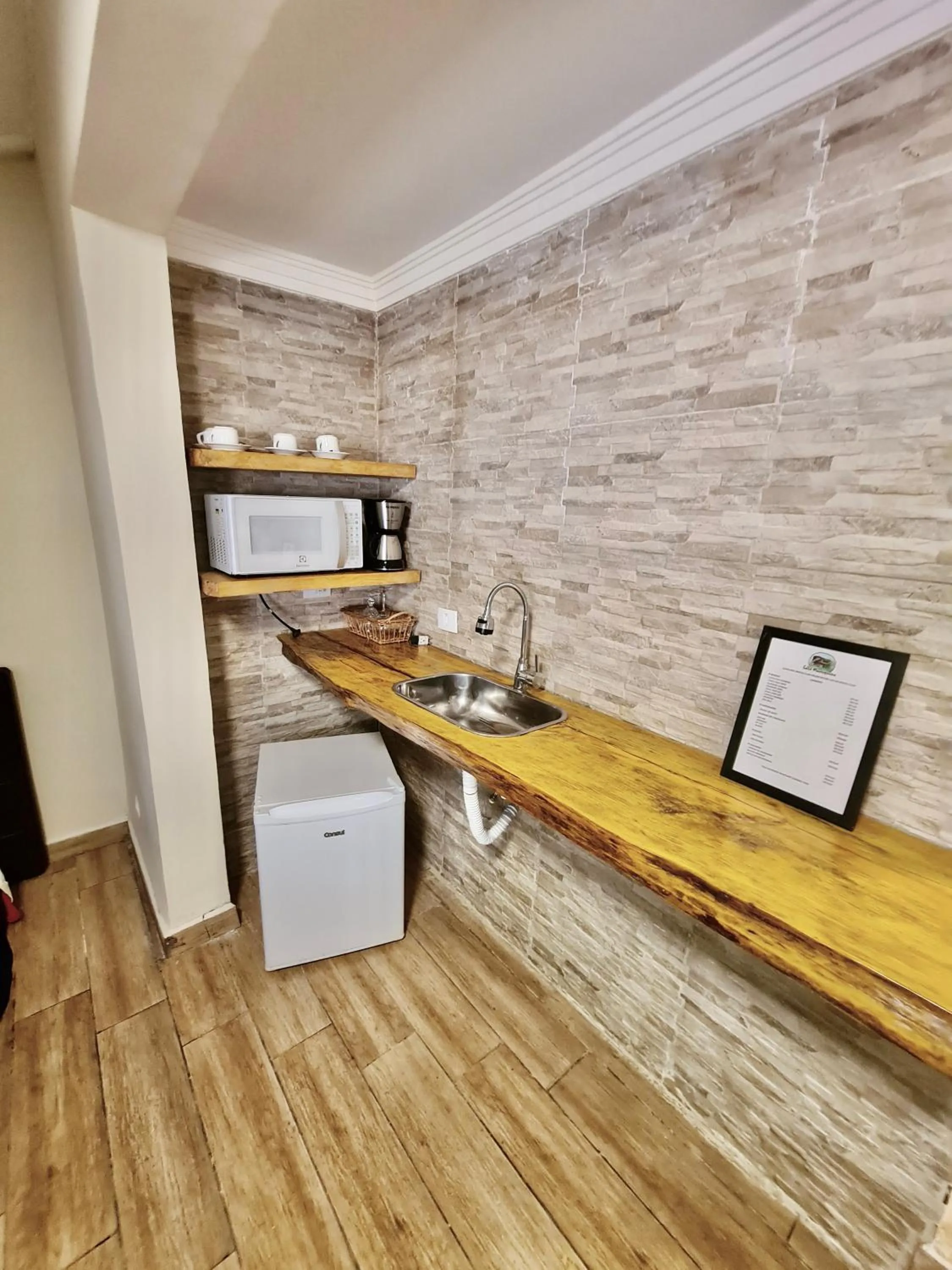 Kitchen or kitchenette in Pousada Casa Mantiqueira - Próxima ao Capivarí e opções de Hidromassagem