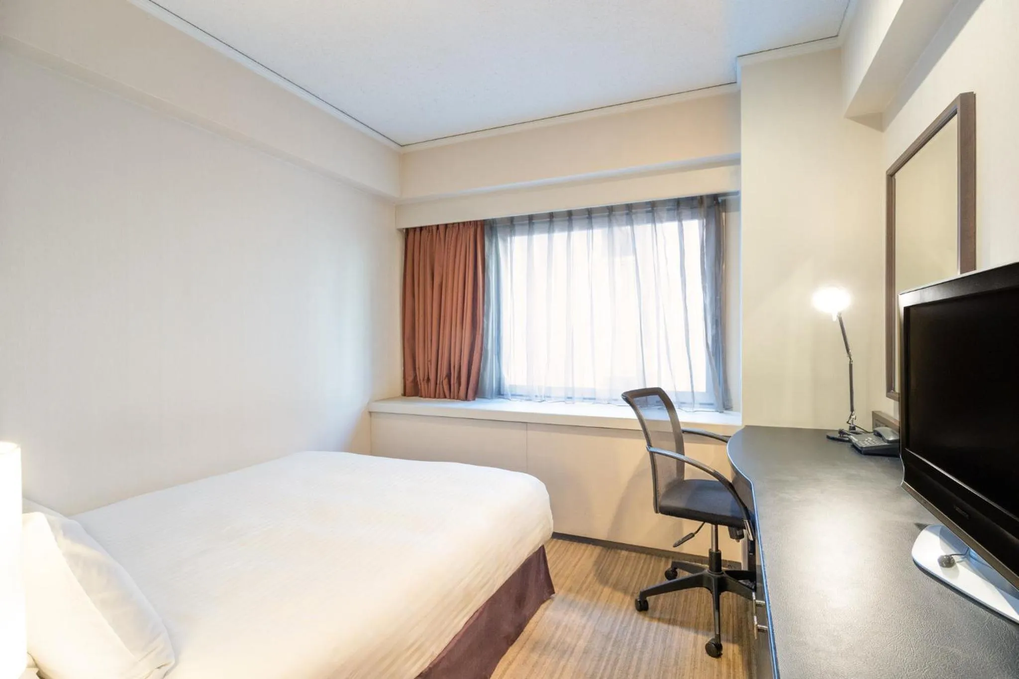 Photo of the whole room, Bed in ANA Crowne Plaza Fukuoka by IHG