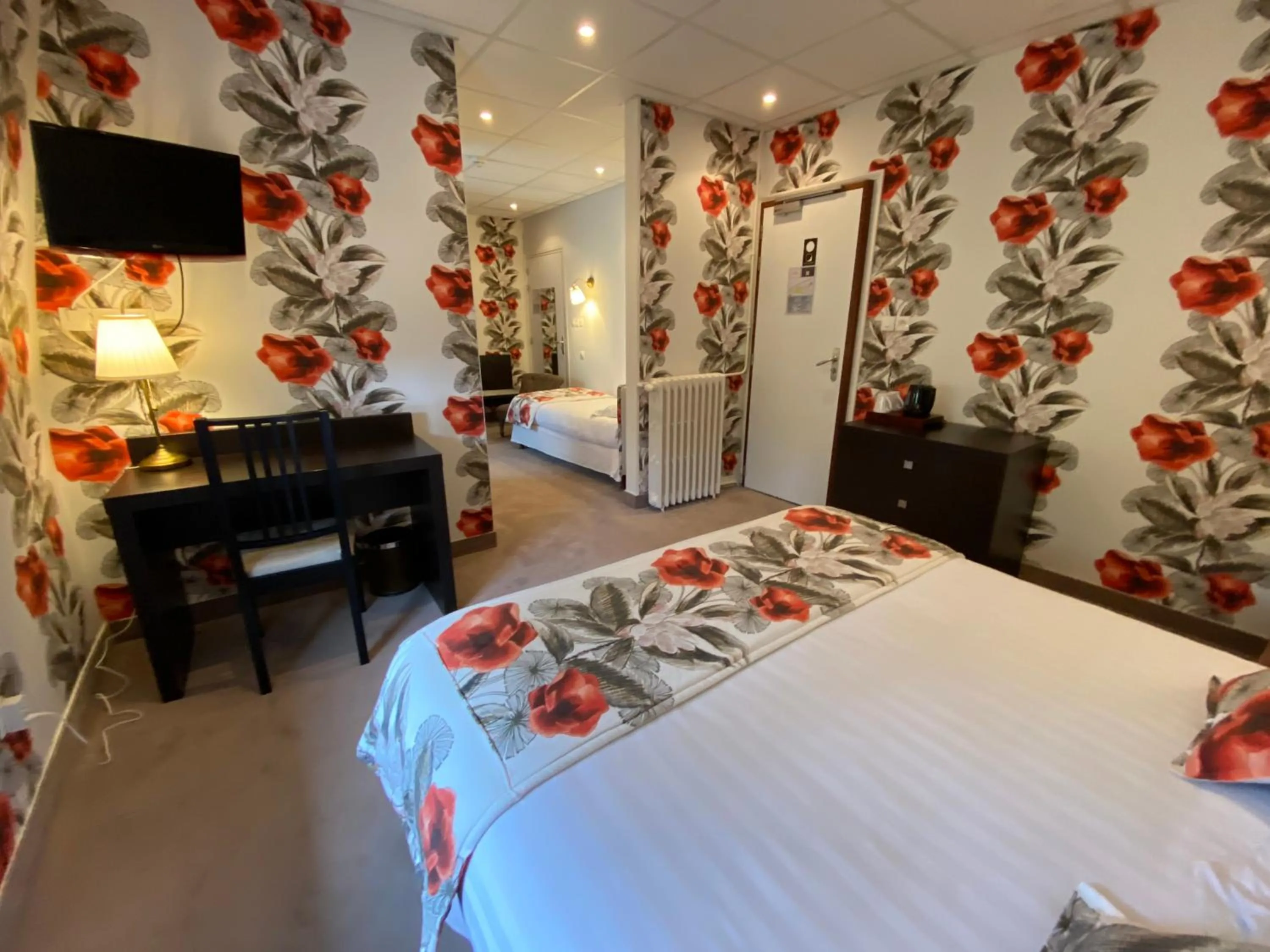 Photo of the whole room, Bed in BRIT HOTEL & SPA Le Roc au Chien