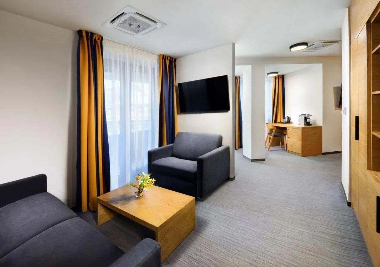 Communal lounge/ TV room in Hotel Galeria Thermal Bešeňová