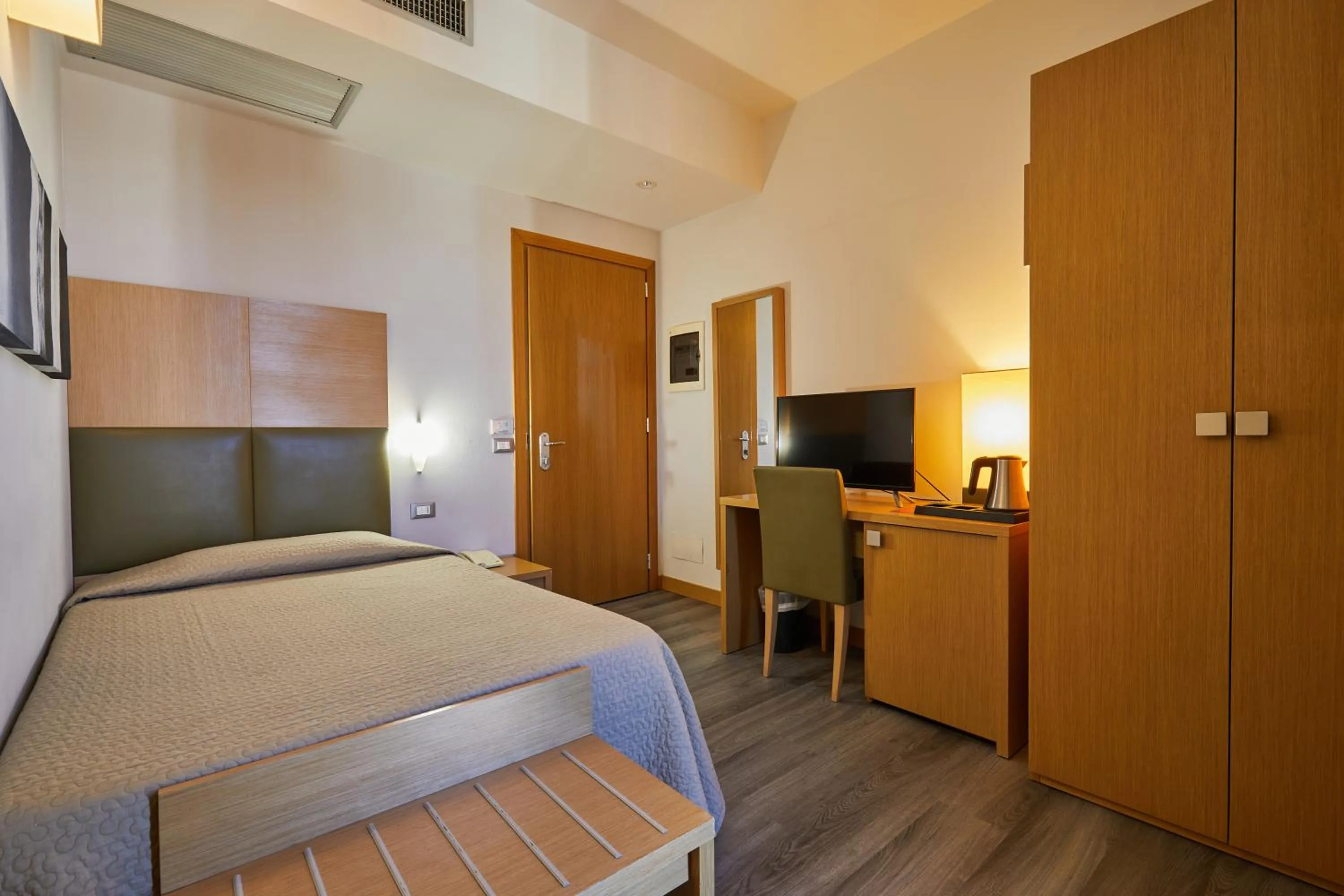 Bed in Castelmartini Wellness & Business Hotel