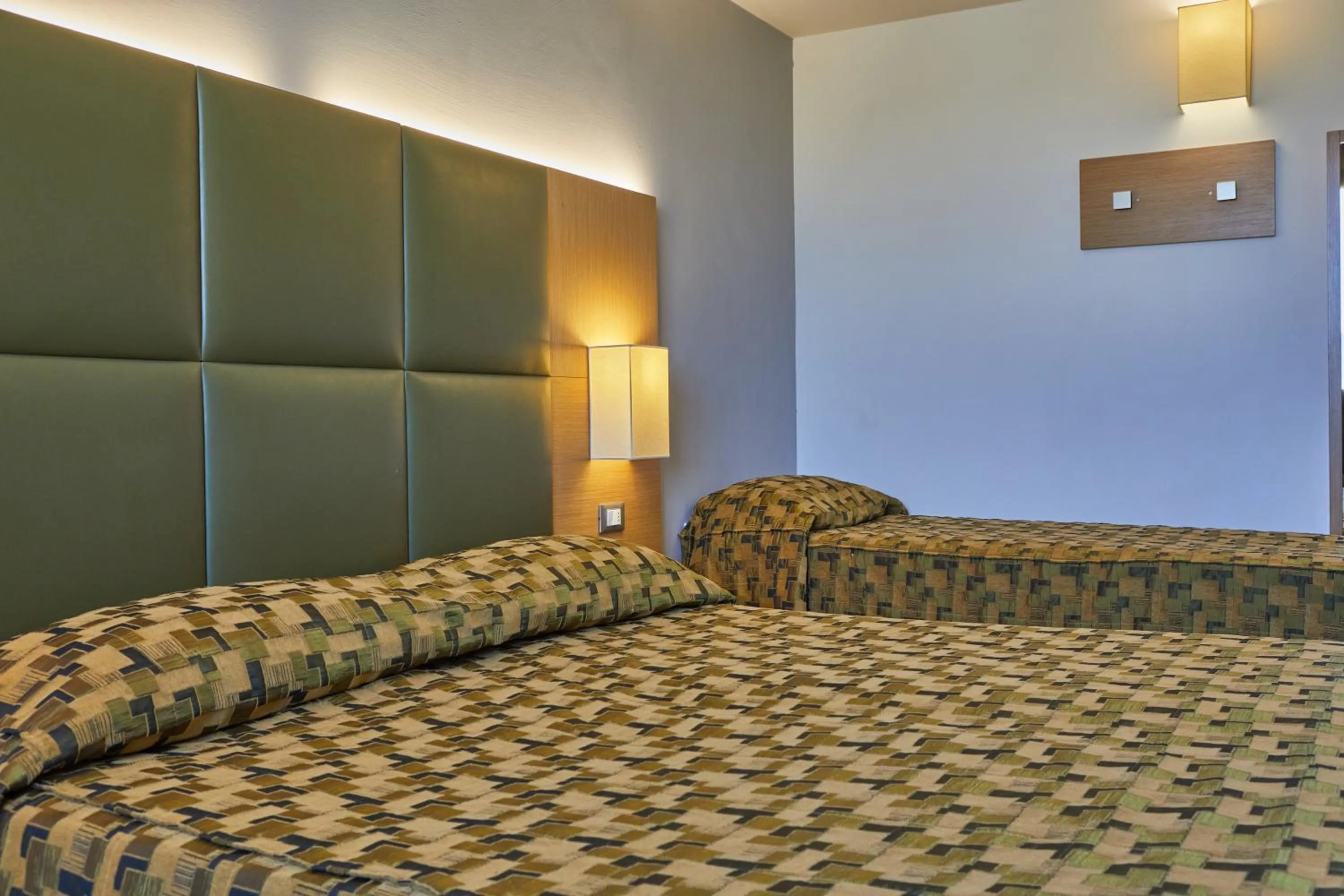 Bed in Castelmartini Wellness & Business Hotel