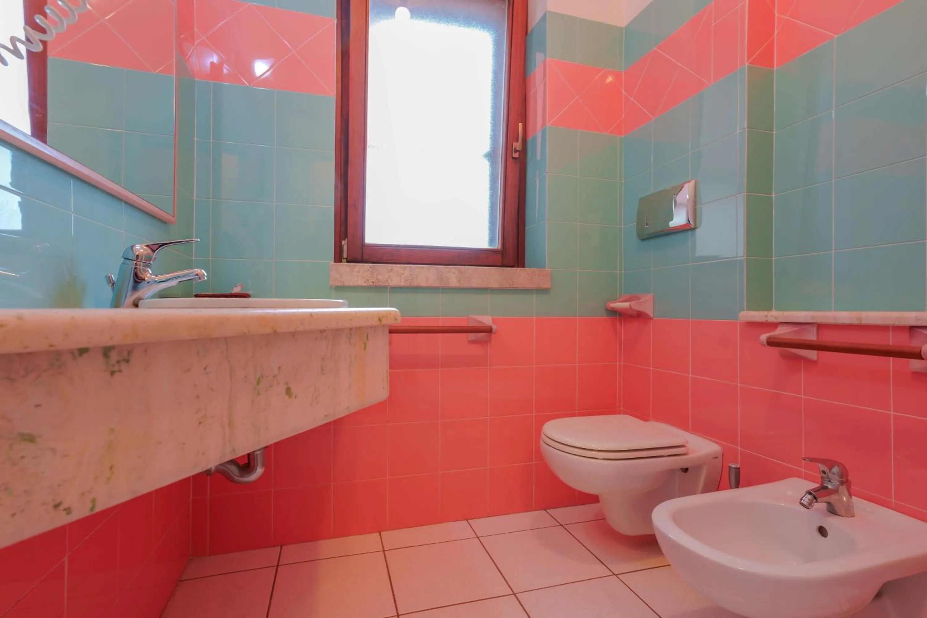 Bathroom in Hotel I Ginepri