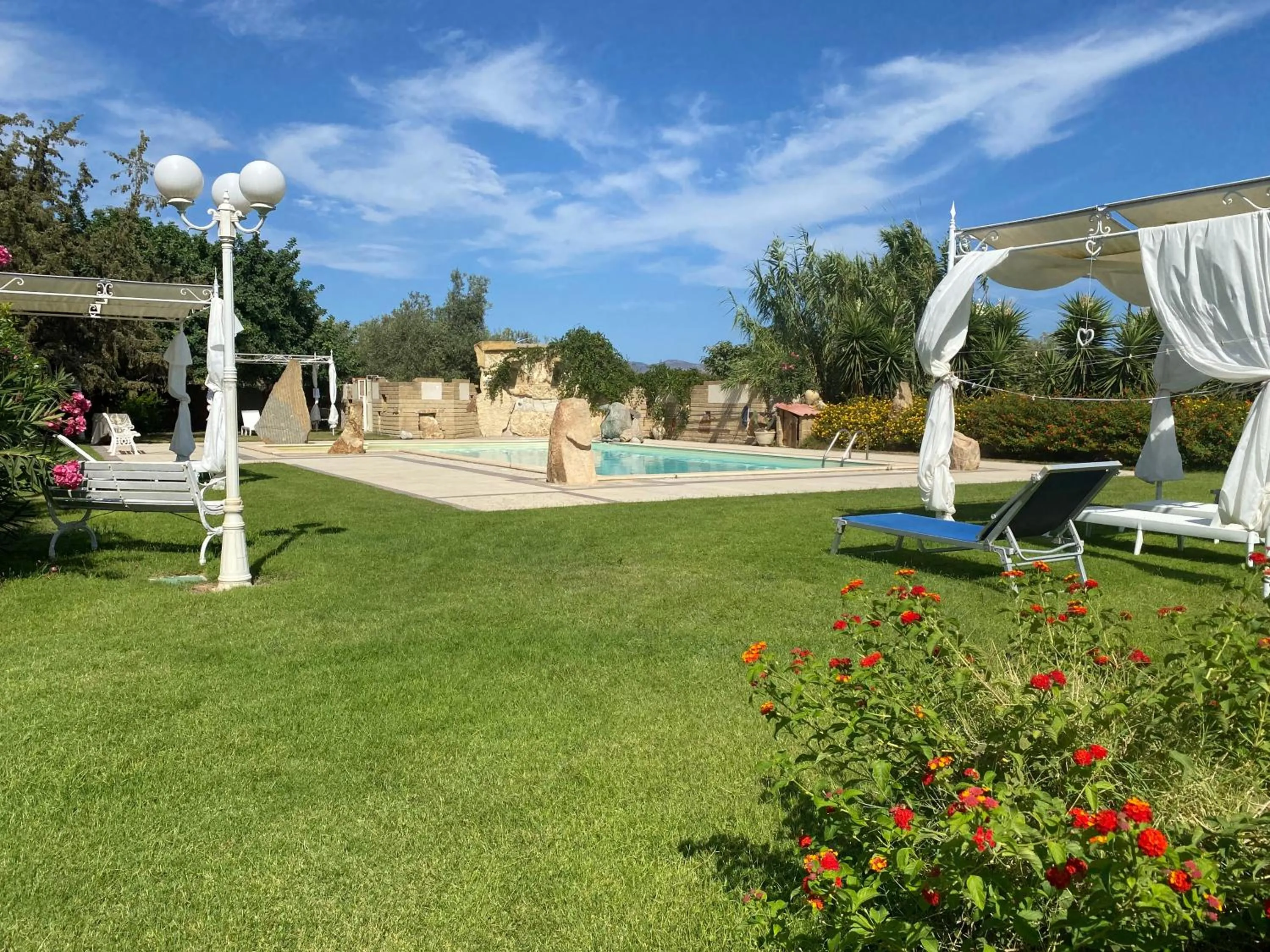 Swimming pool in Hotel I Ginepri