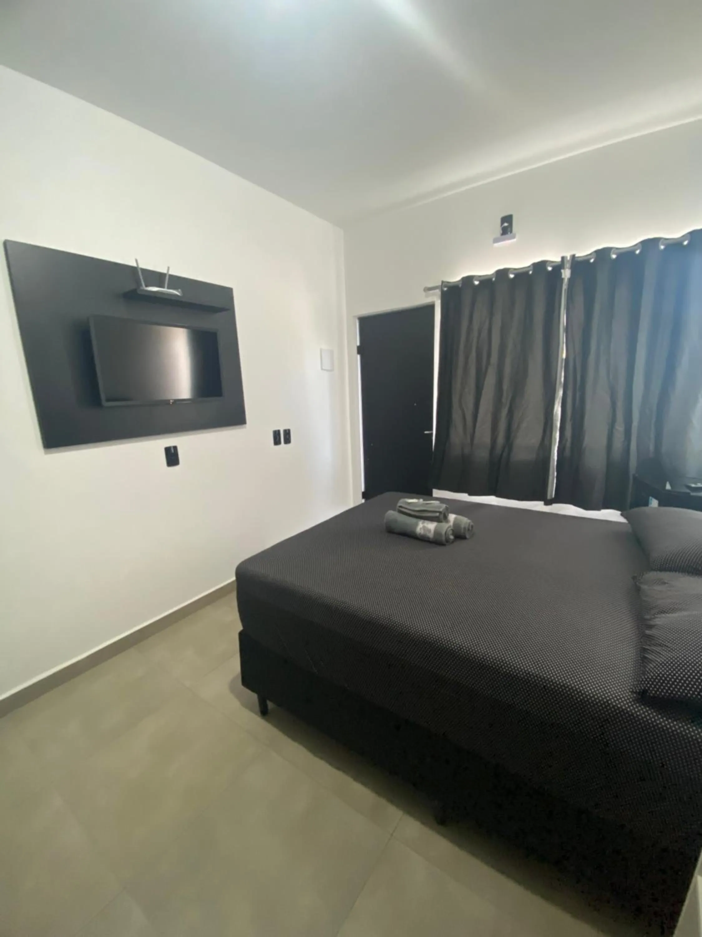 Bed in Pousada Tio Tonho