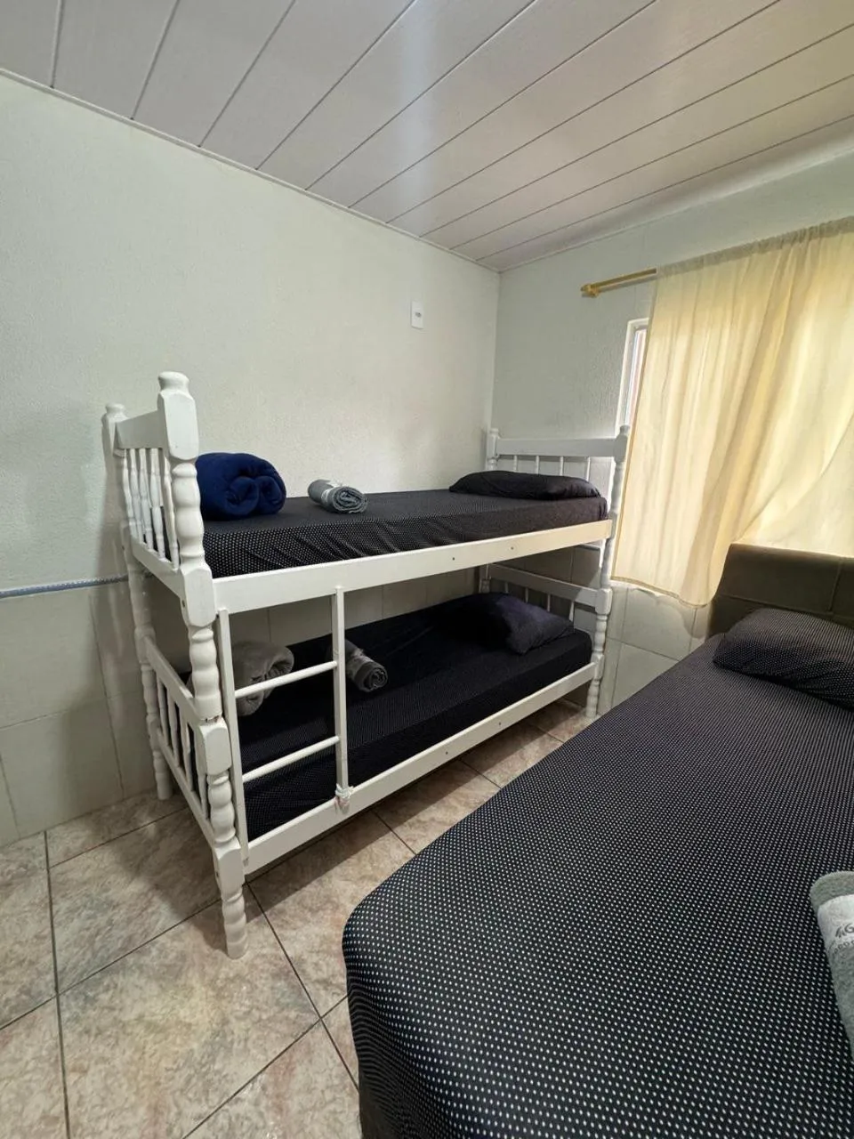 Bed in Pousada Tio Tonho