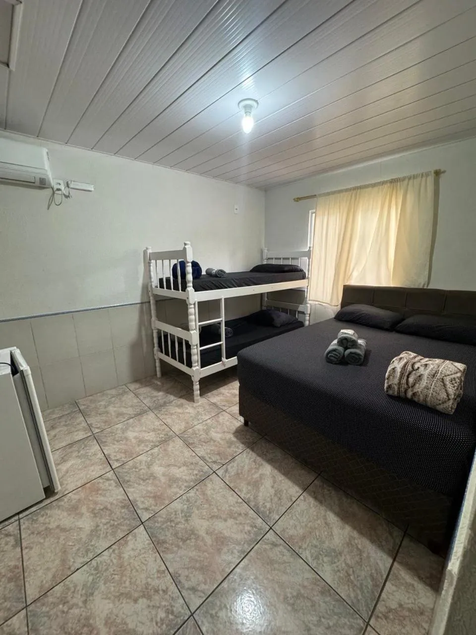 Bed in Pousada Tio Tonho