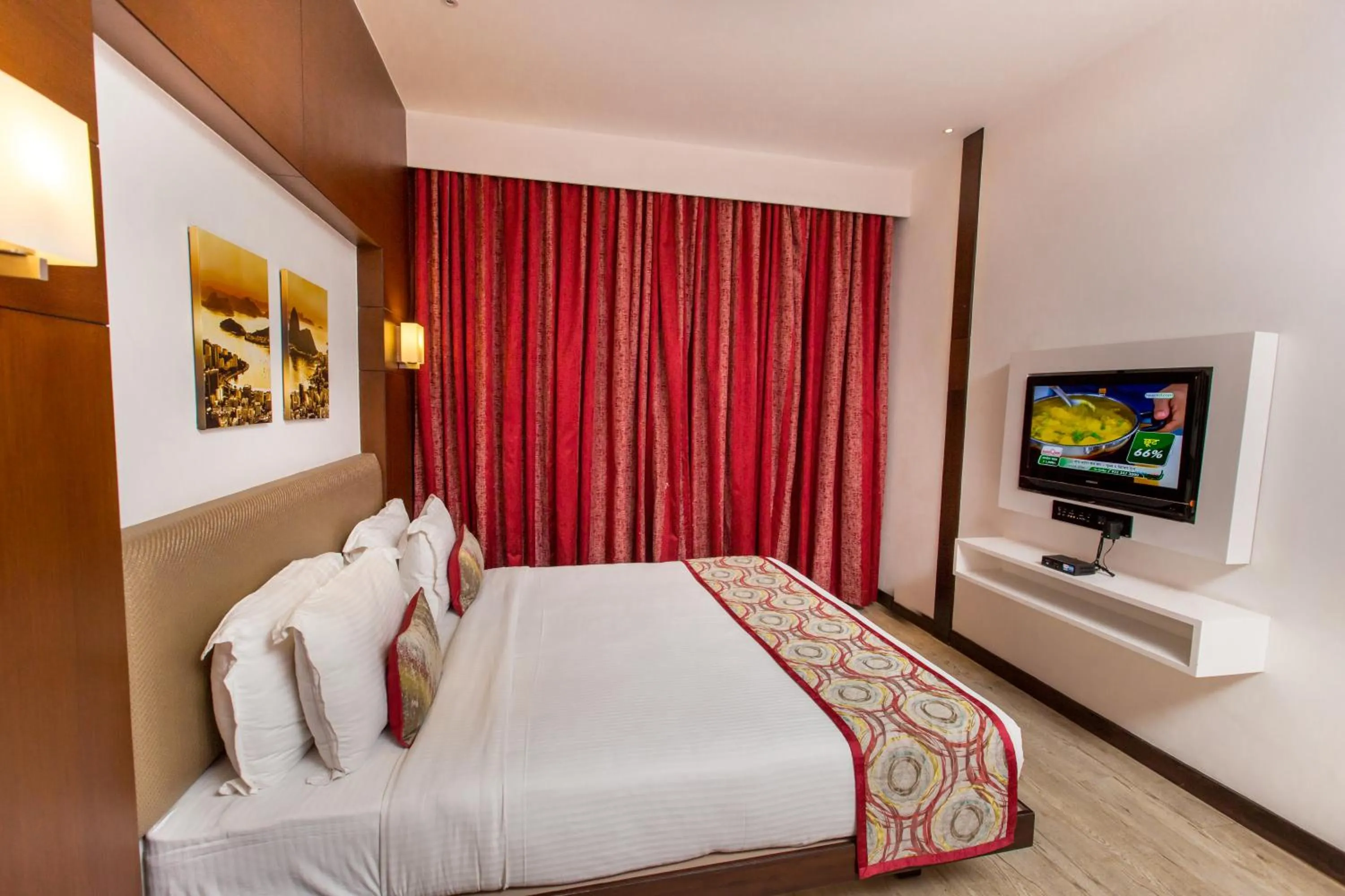 Communal lounge/ TV room, Bed in Hash Six Hotels