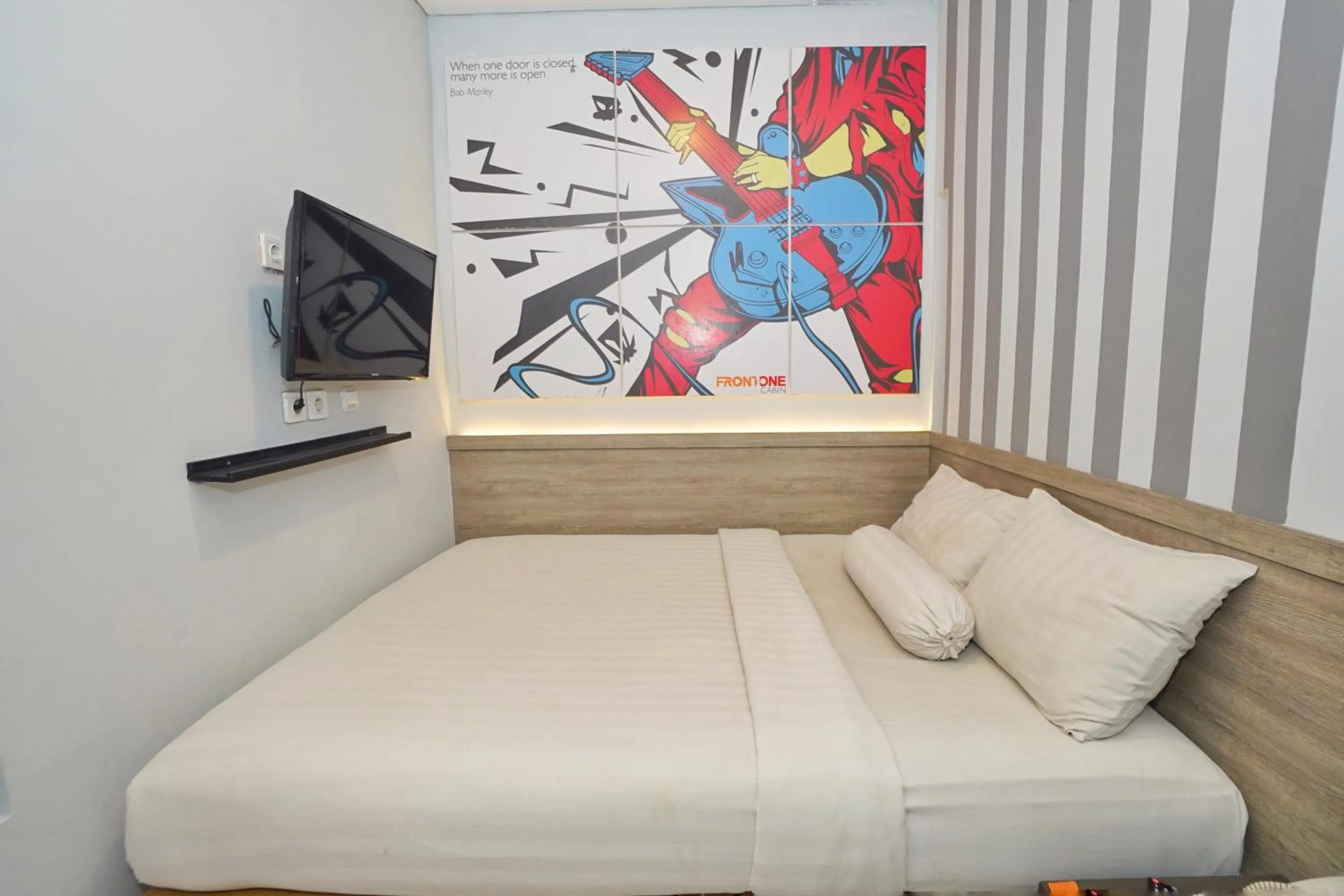 Bed in Front One Budget Hotel Tirtonadi Solo