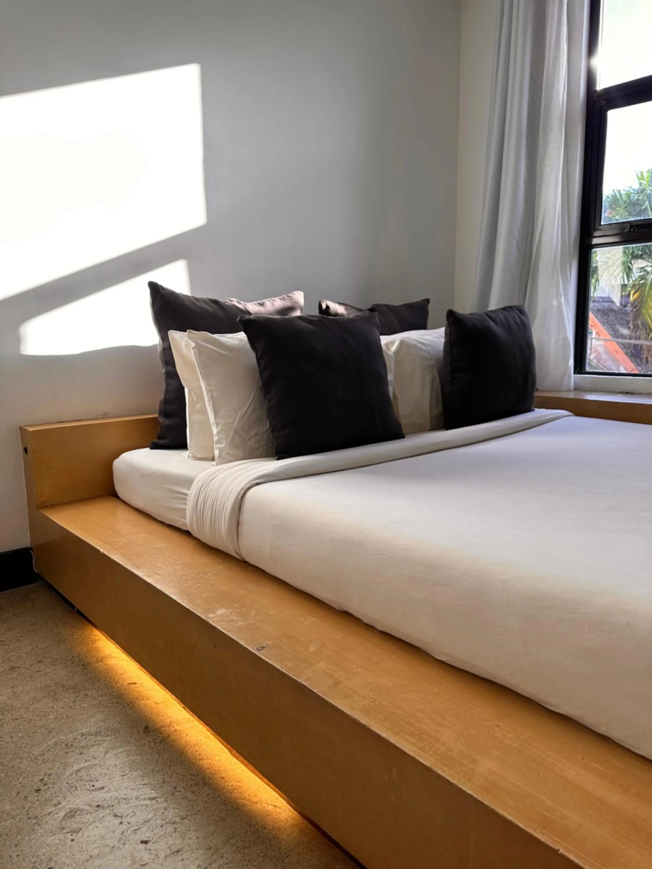 Bed in Urban Boutique Hotel