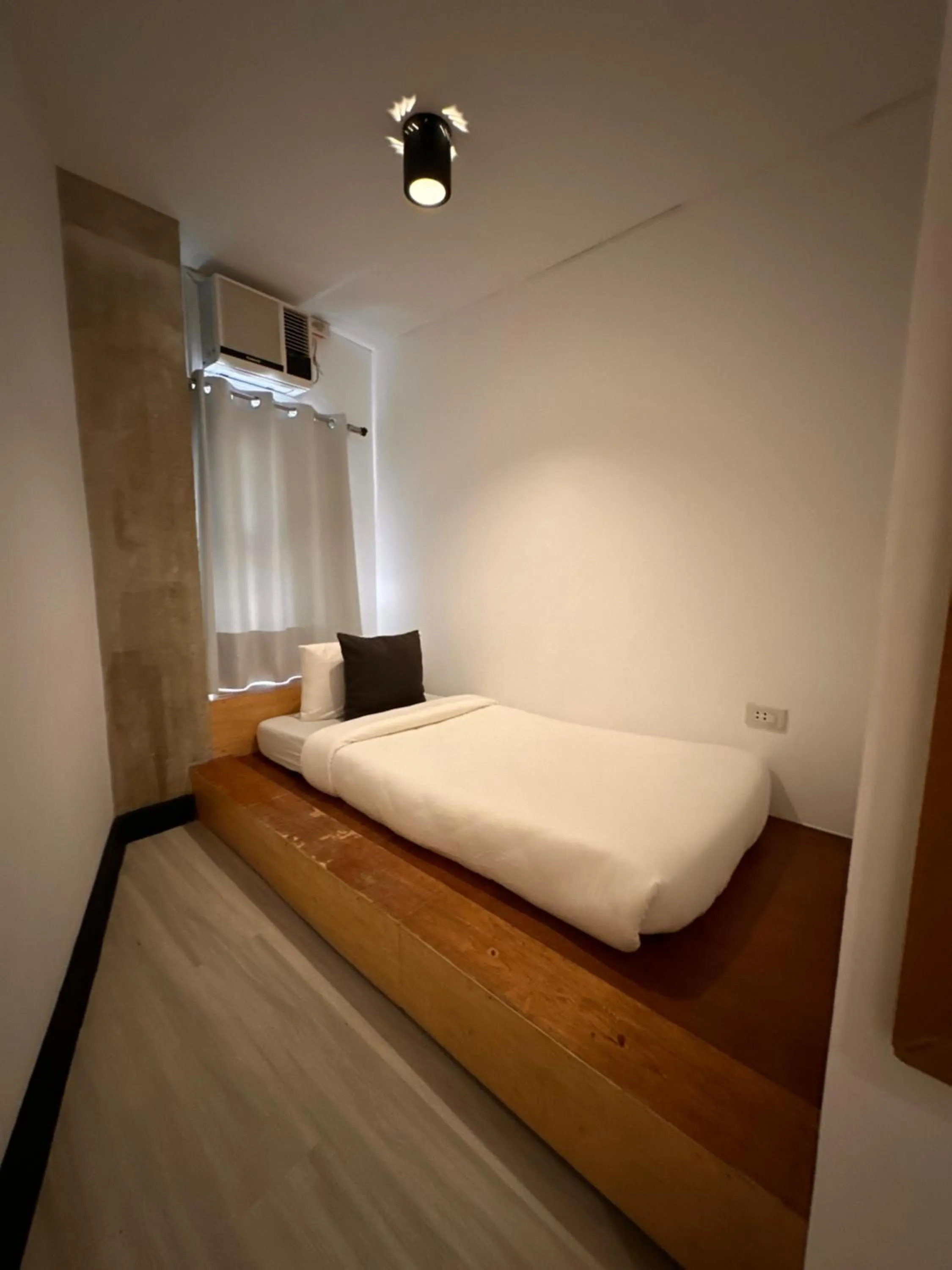 Bed in Urban Boutique Hotel