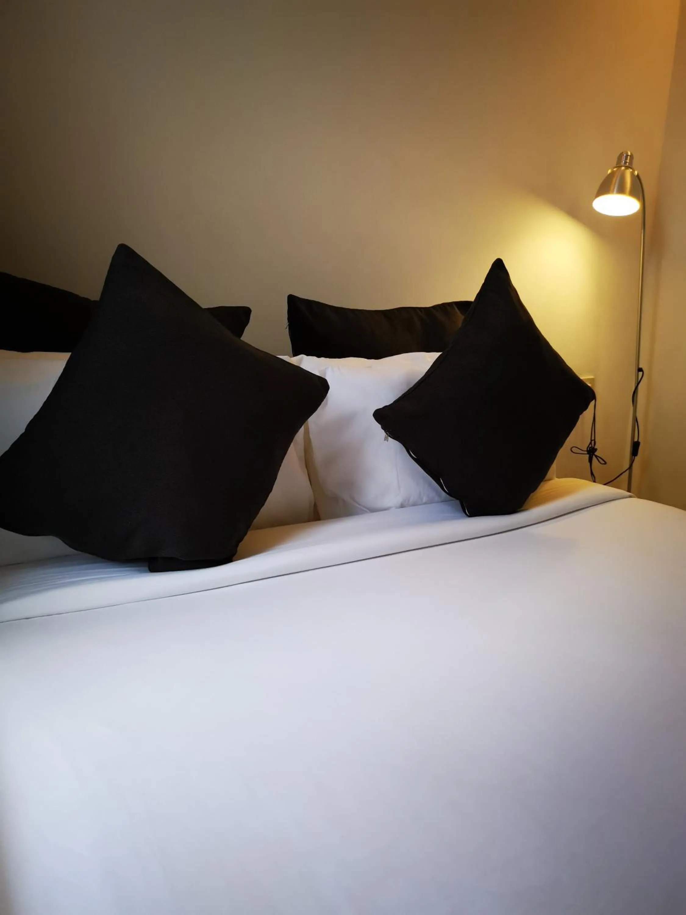 Bed in Urban Boutique Hotel