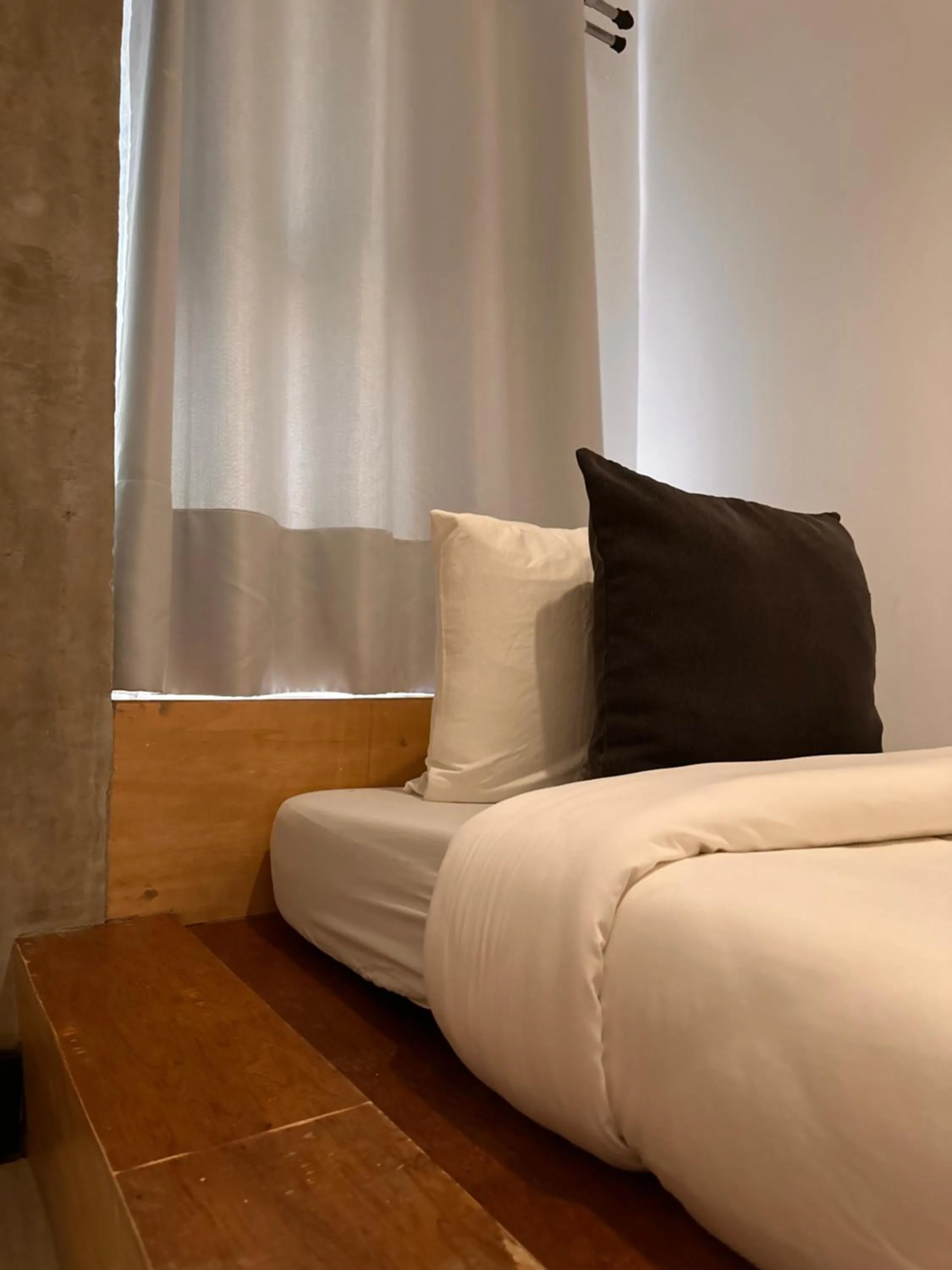 Bed in Urban Boutique Hotel