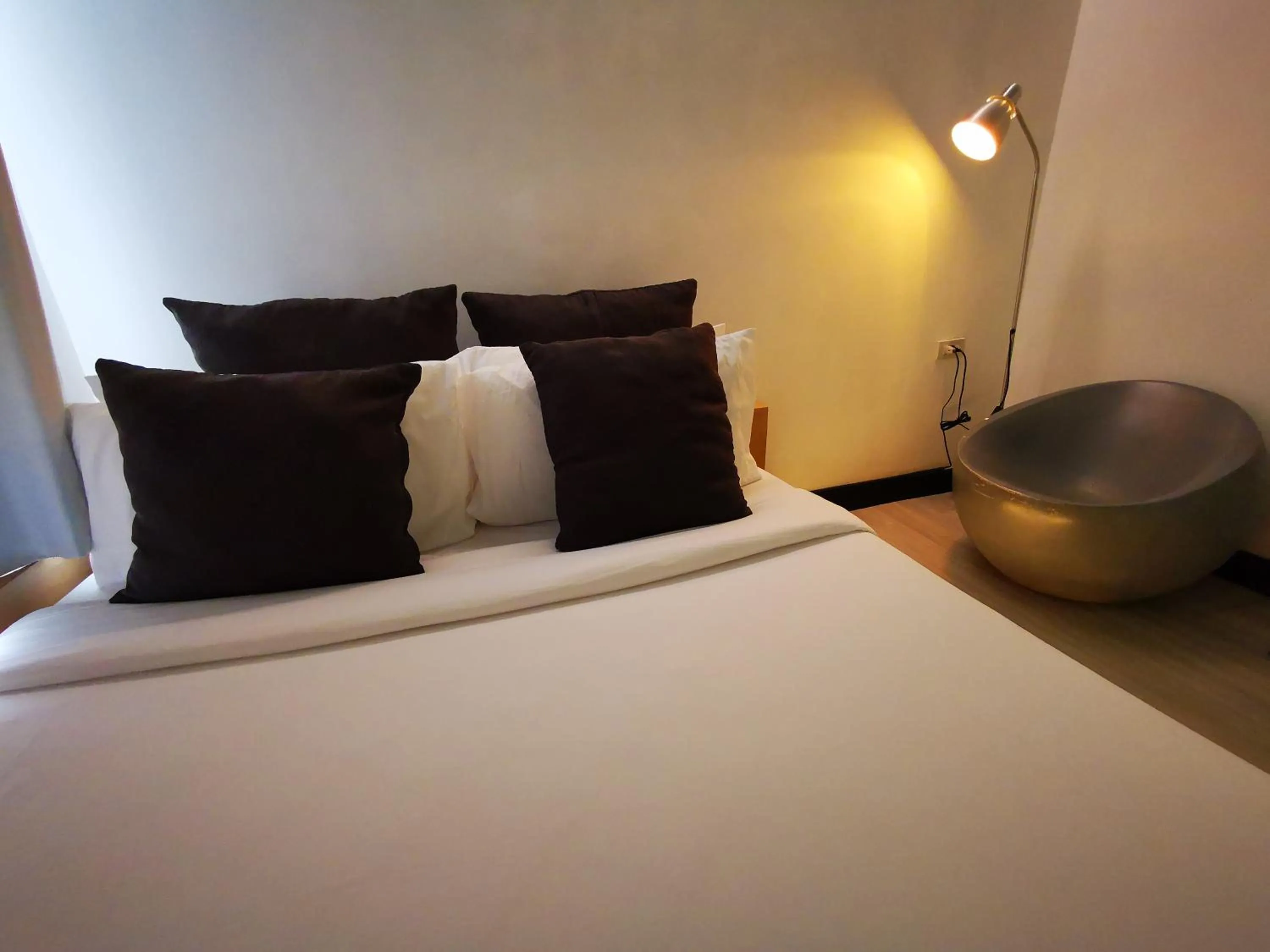 Bed in Urban Boutique Hotel