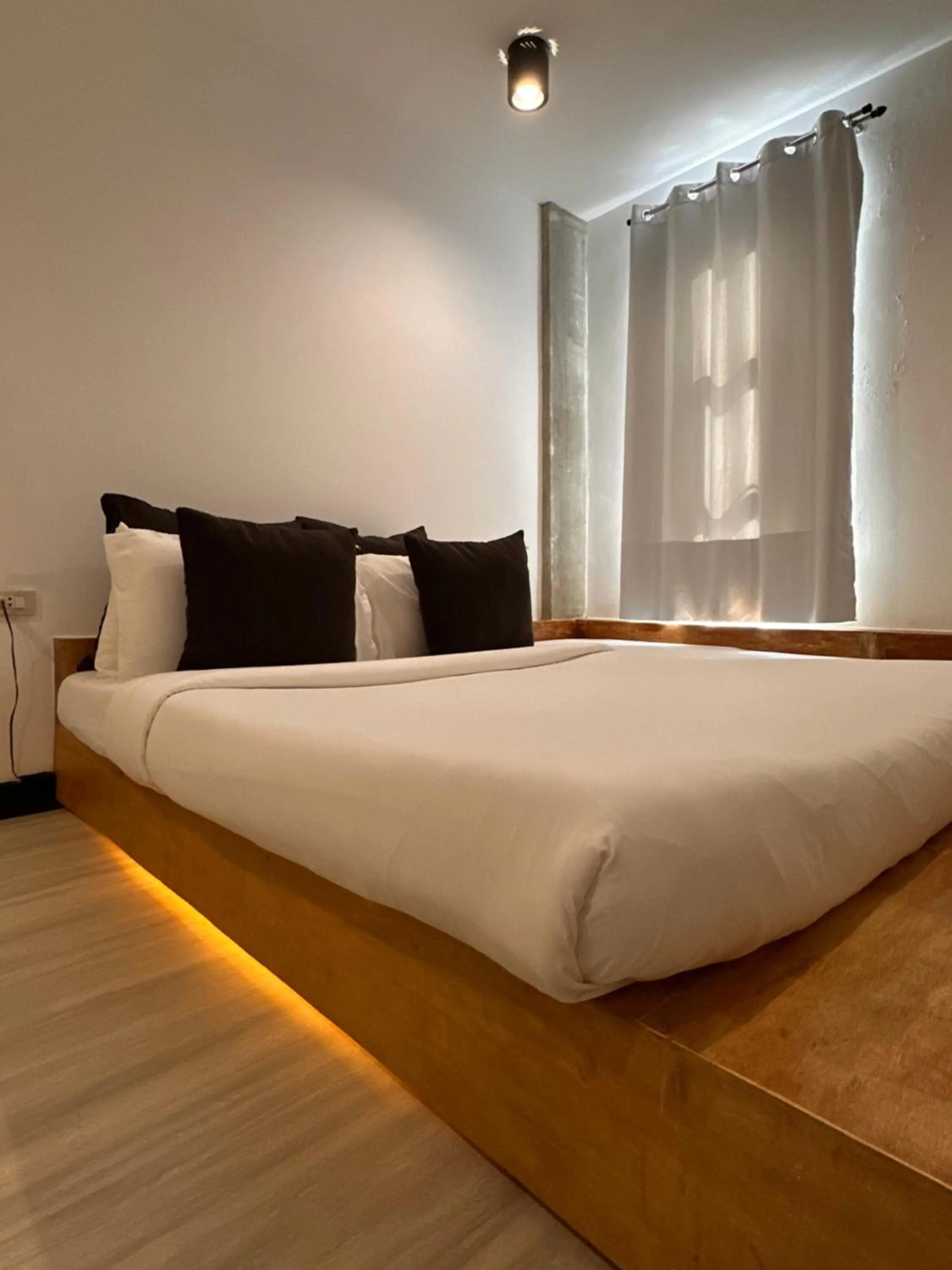 Bed in Urban Boutique Hotel