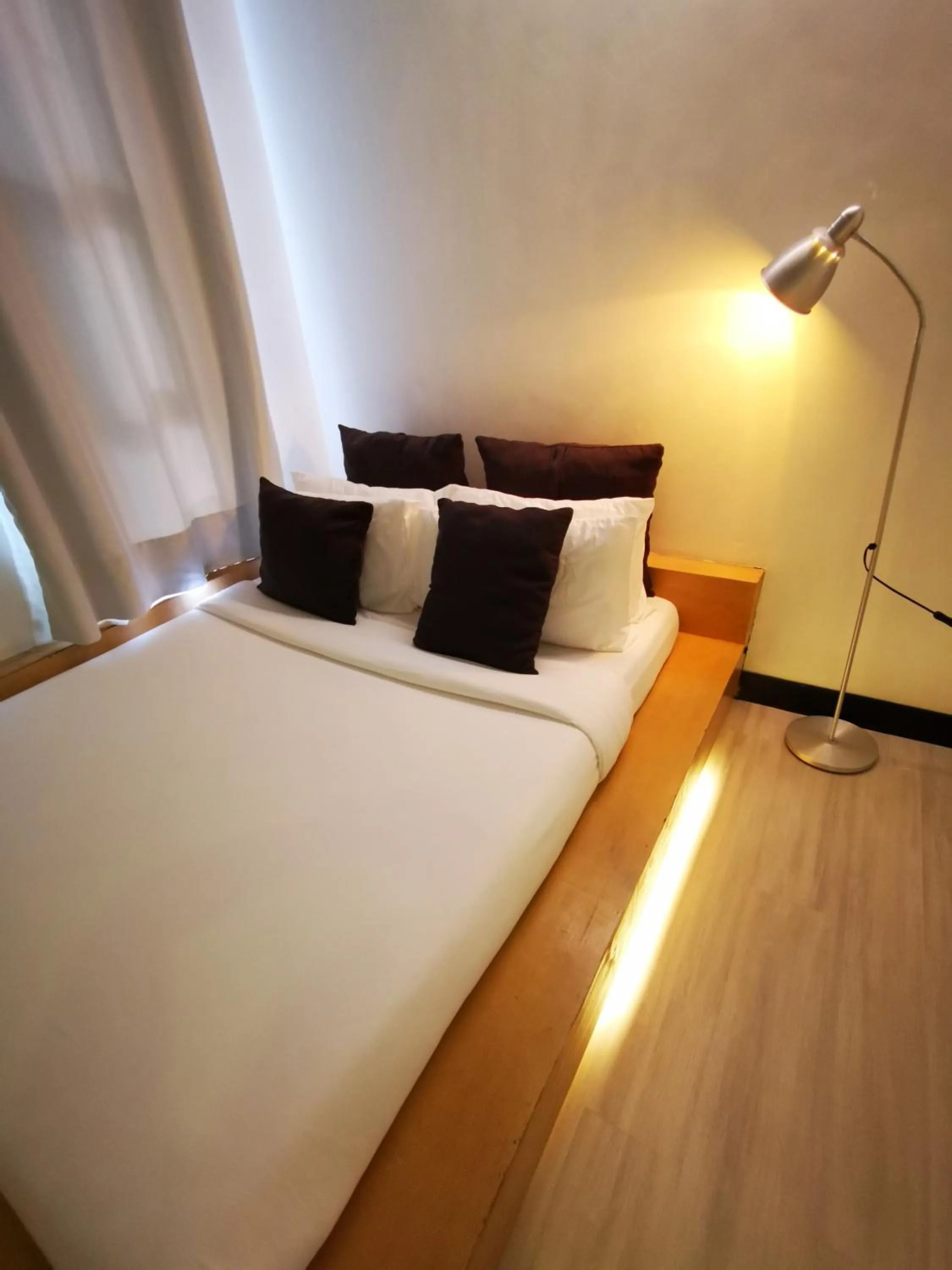 Bed in Urban Boutique Hotel