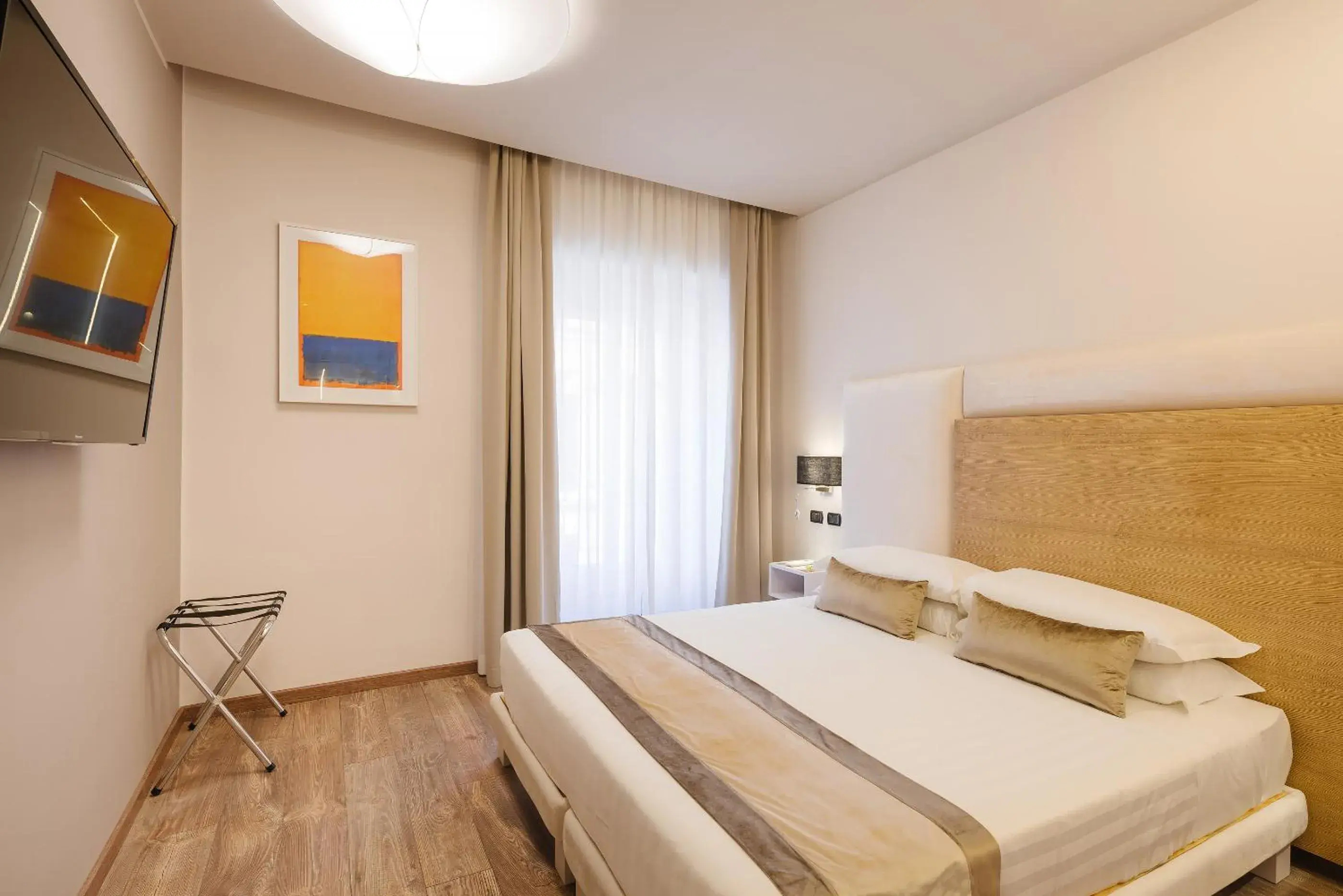 Classic Triple Room in Etruska luxury Trastevere Guesthouse Classic Triple Room in Etruska luxury Trastevere Guesthouse