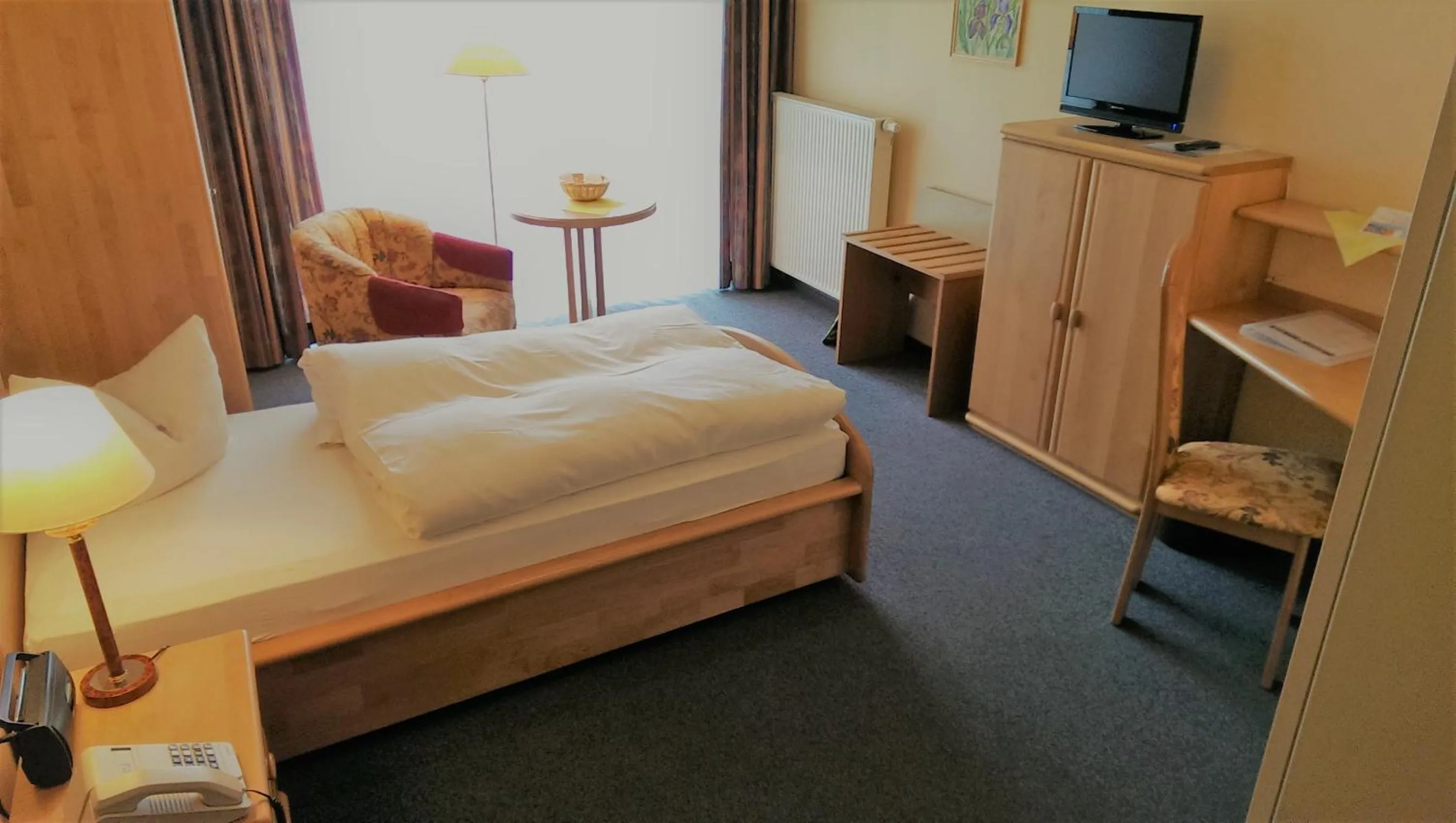 Photo of the whole room, Bed in Aktivhotel Heikenberg in Bad Lauterberg