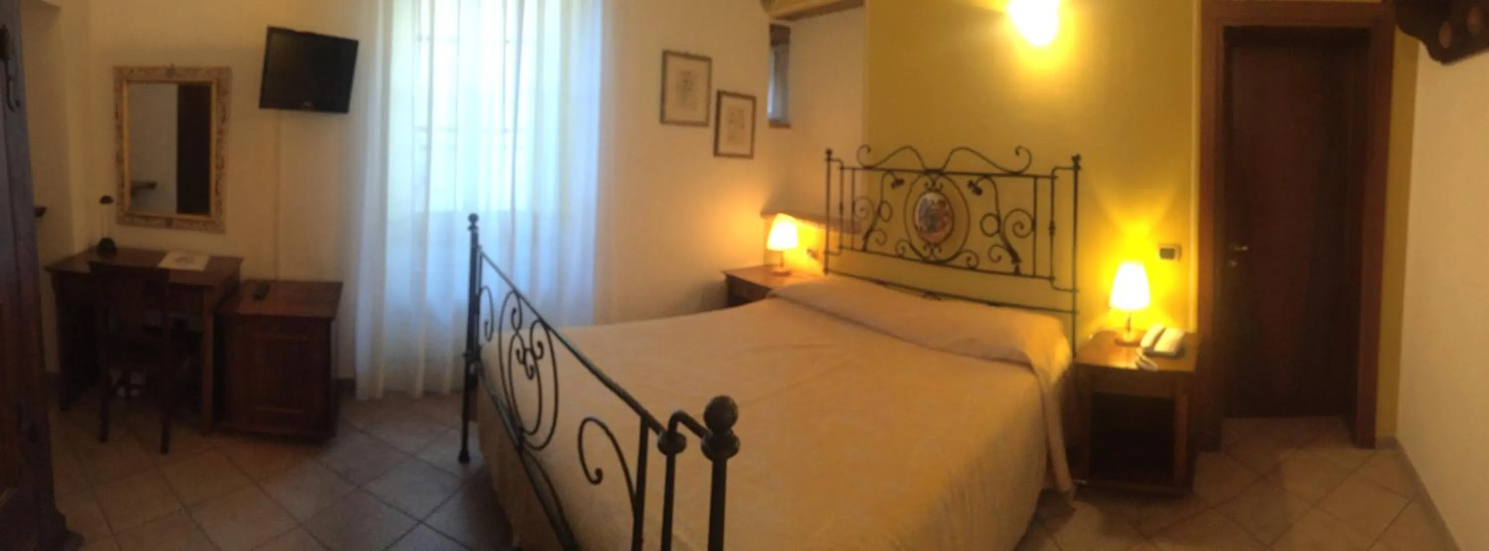 Bed in Hotel Palazzo Brunamonti
