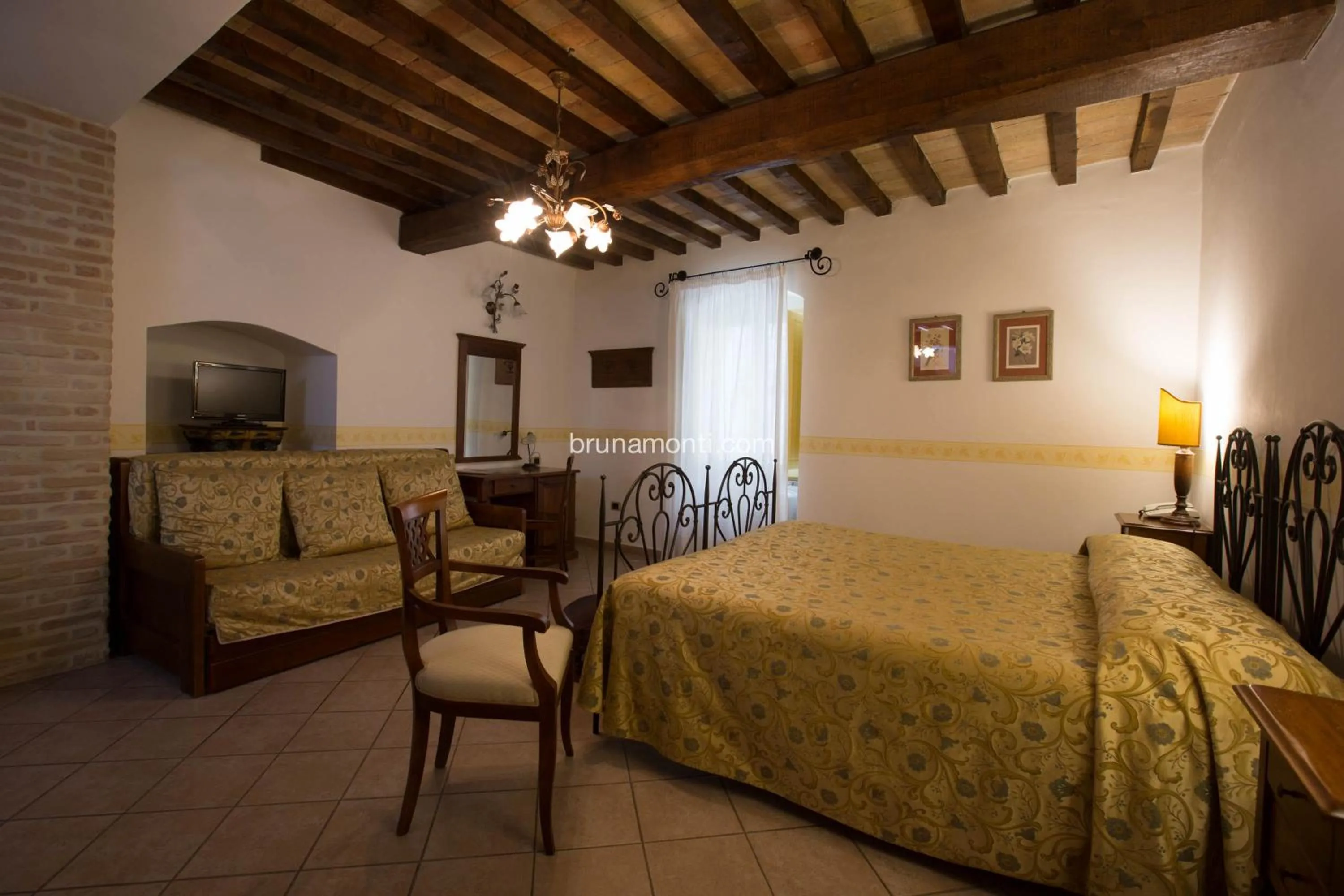 Bed in Hotel Palazzo Brunamonti