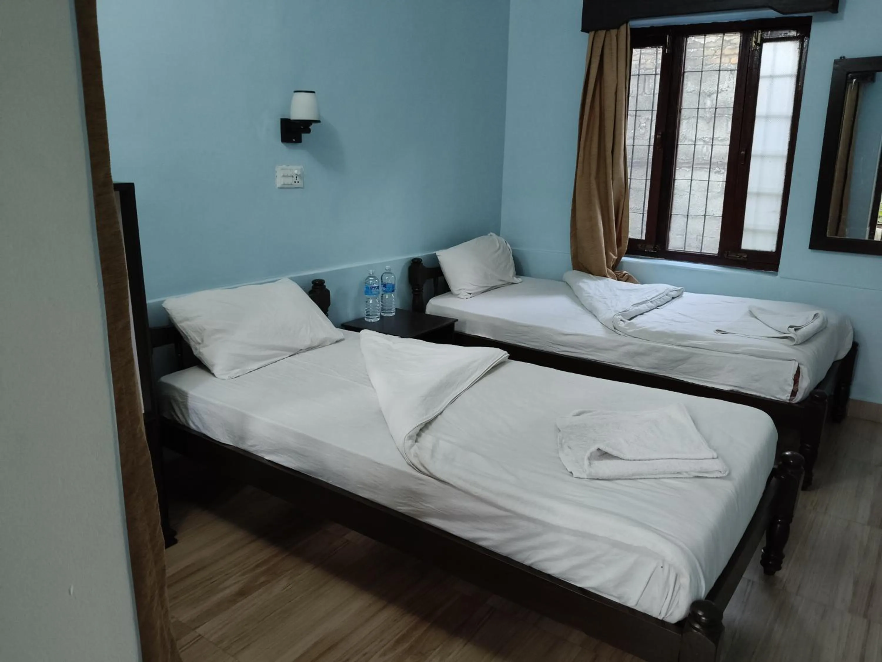 Bed in Yeti Guest House