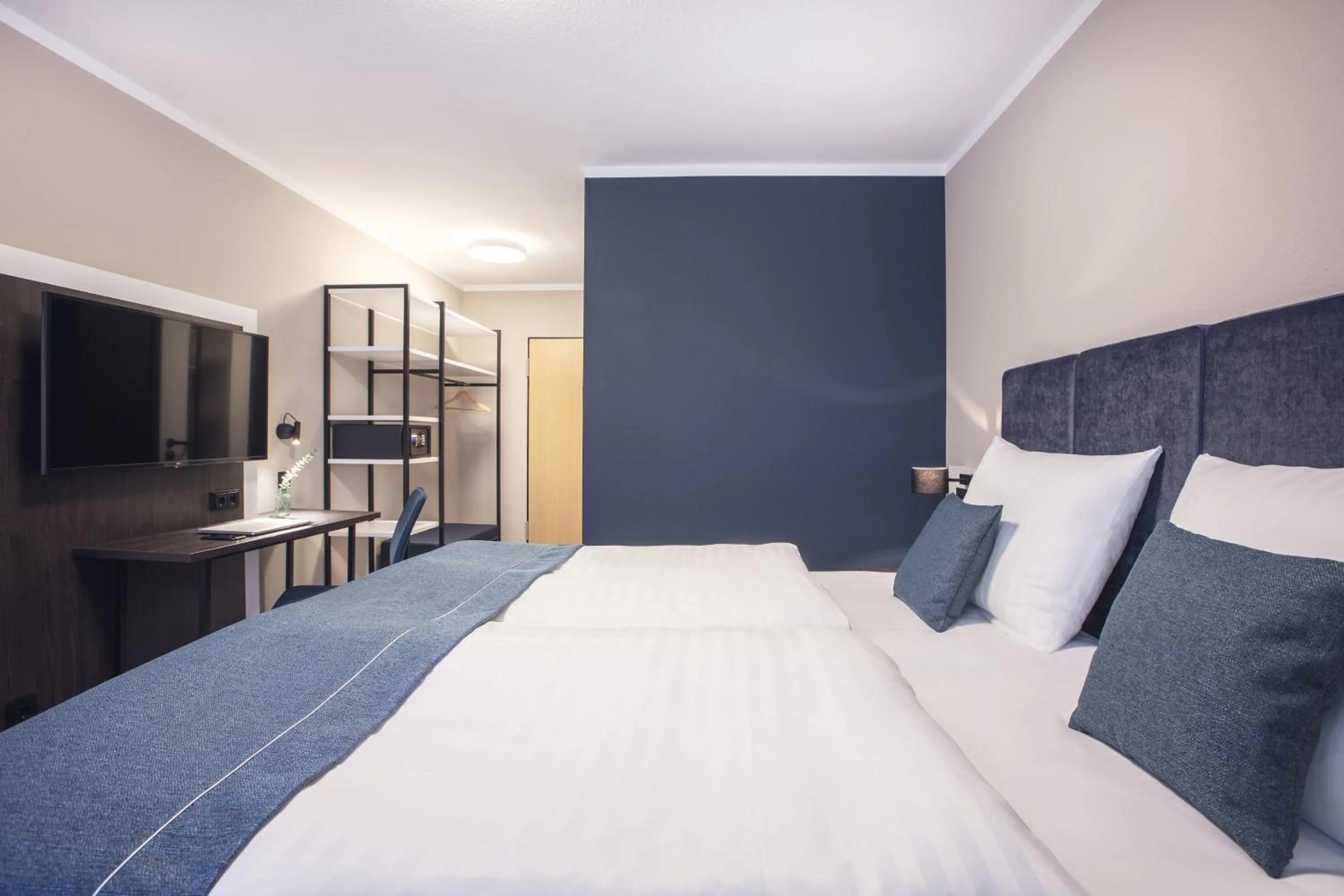 Bedroom, Bed in Garner Hotel Elmshorn by IHG