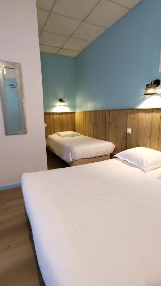 Bed in Hotel Le Colibri