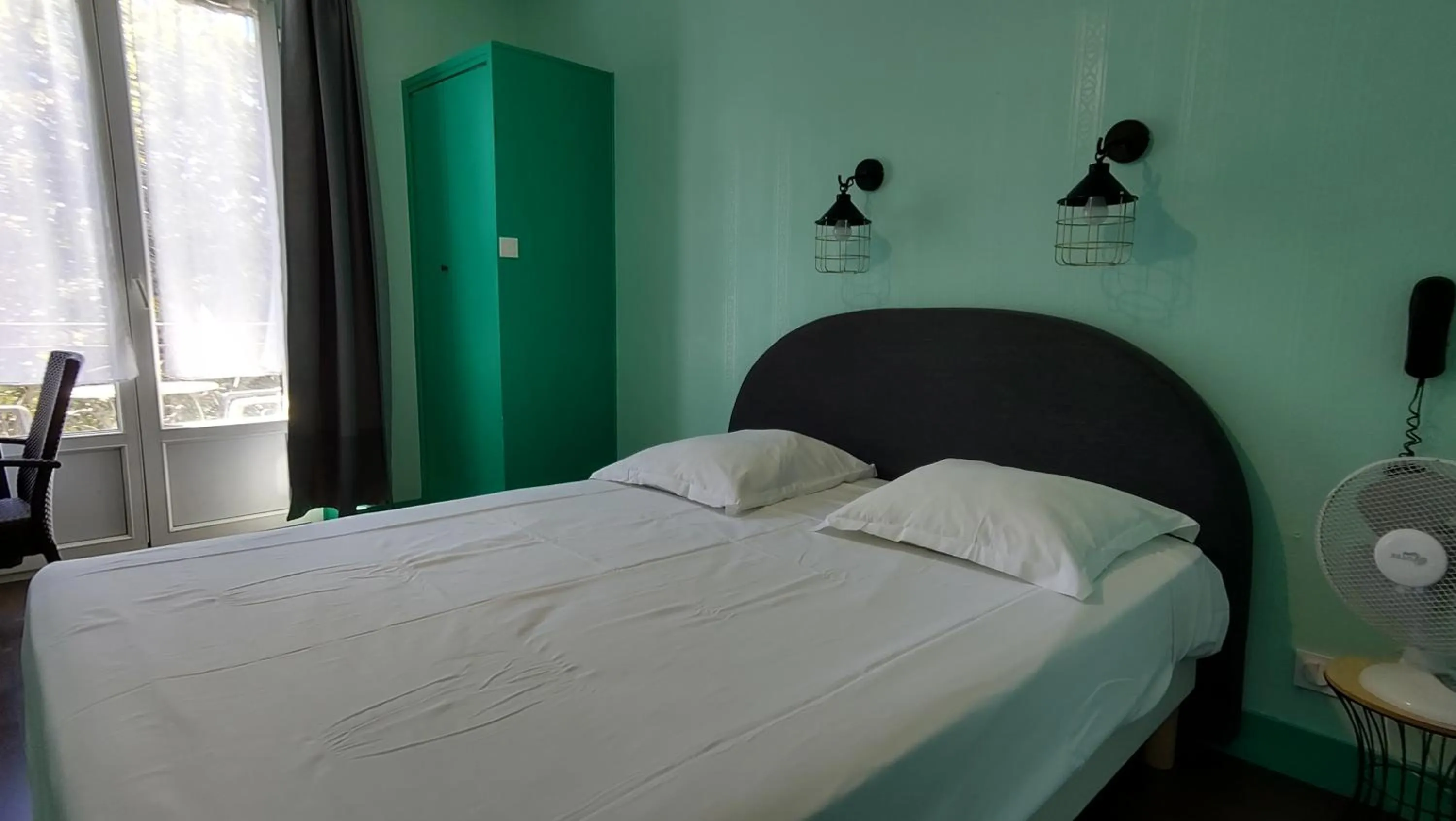 Bed in Hotel Le Colibri