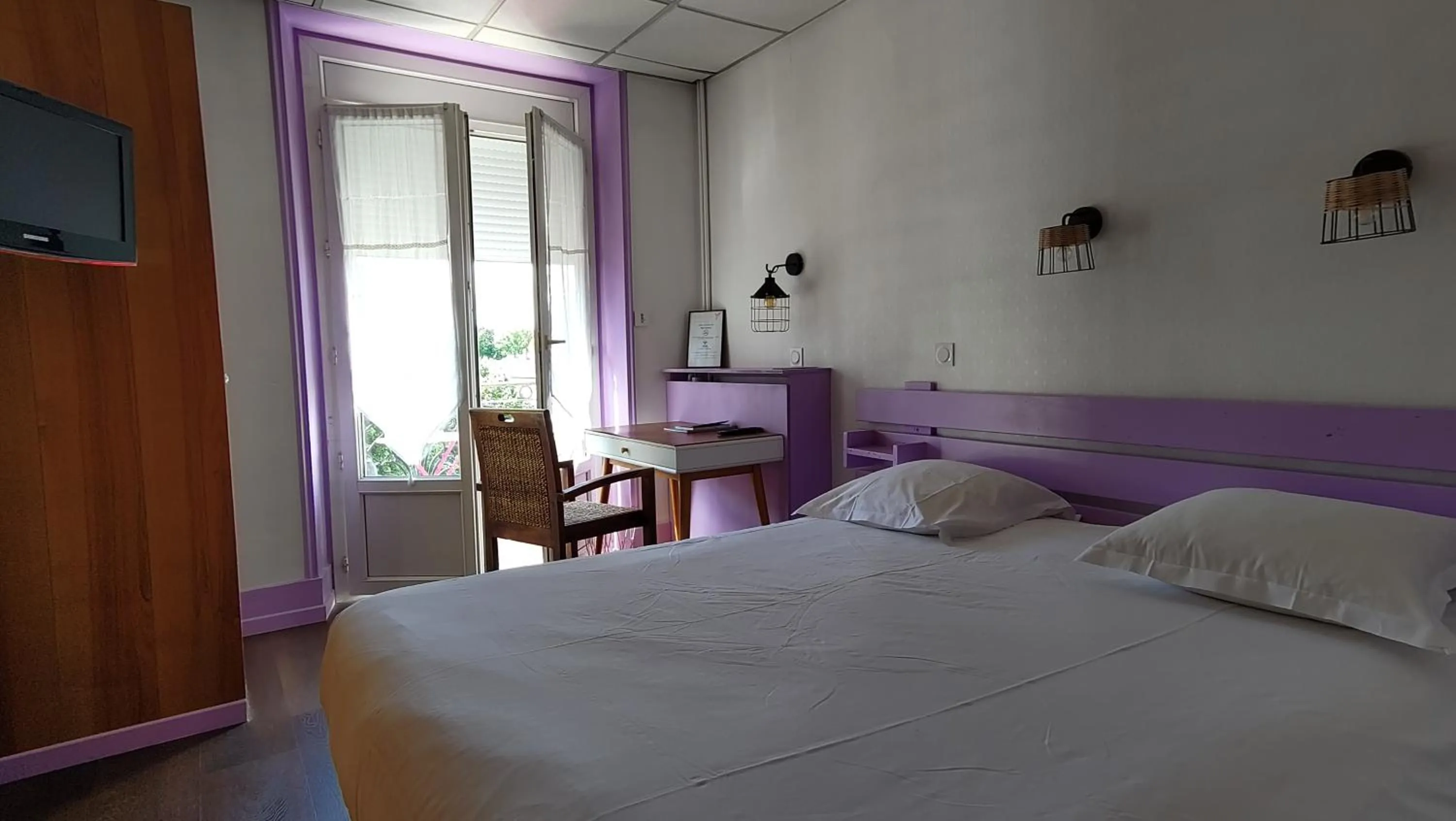 Bed in Hotel Le Colibri