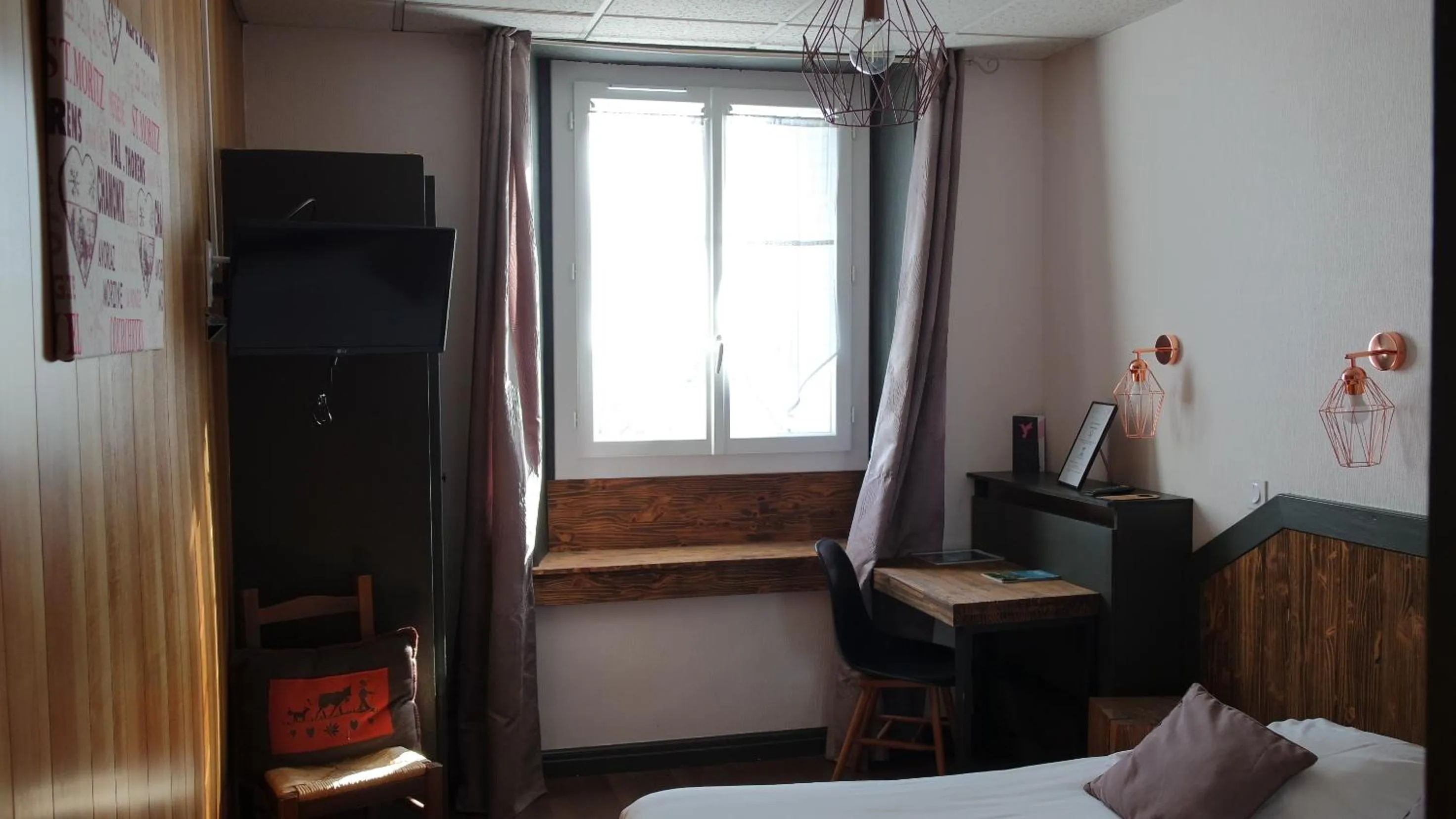 Bed in Hotel Le Colibri