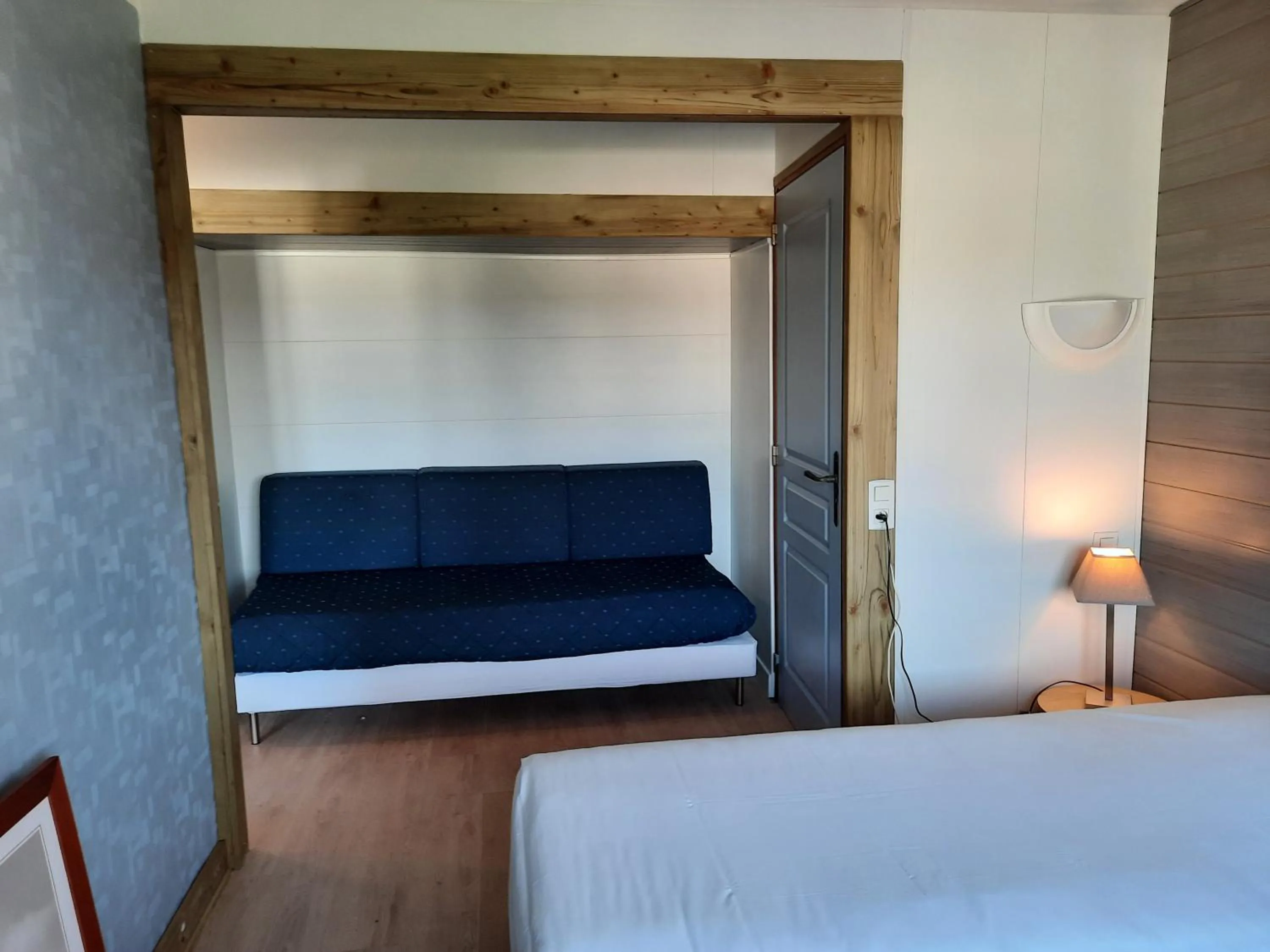Bed in Hôtel des îles