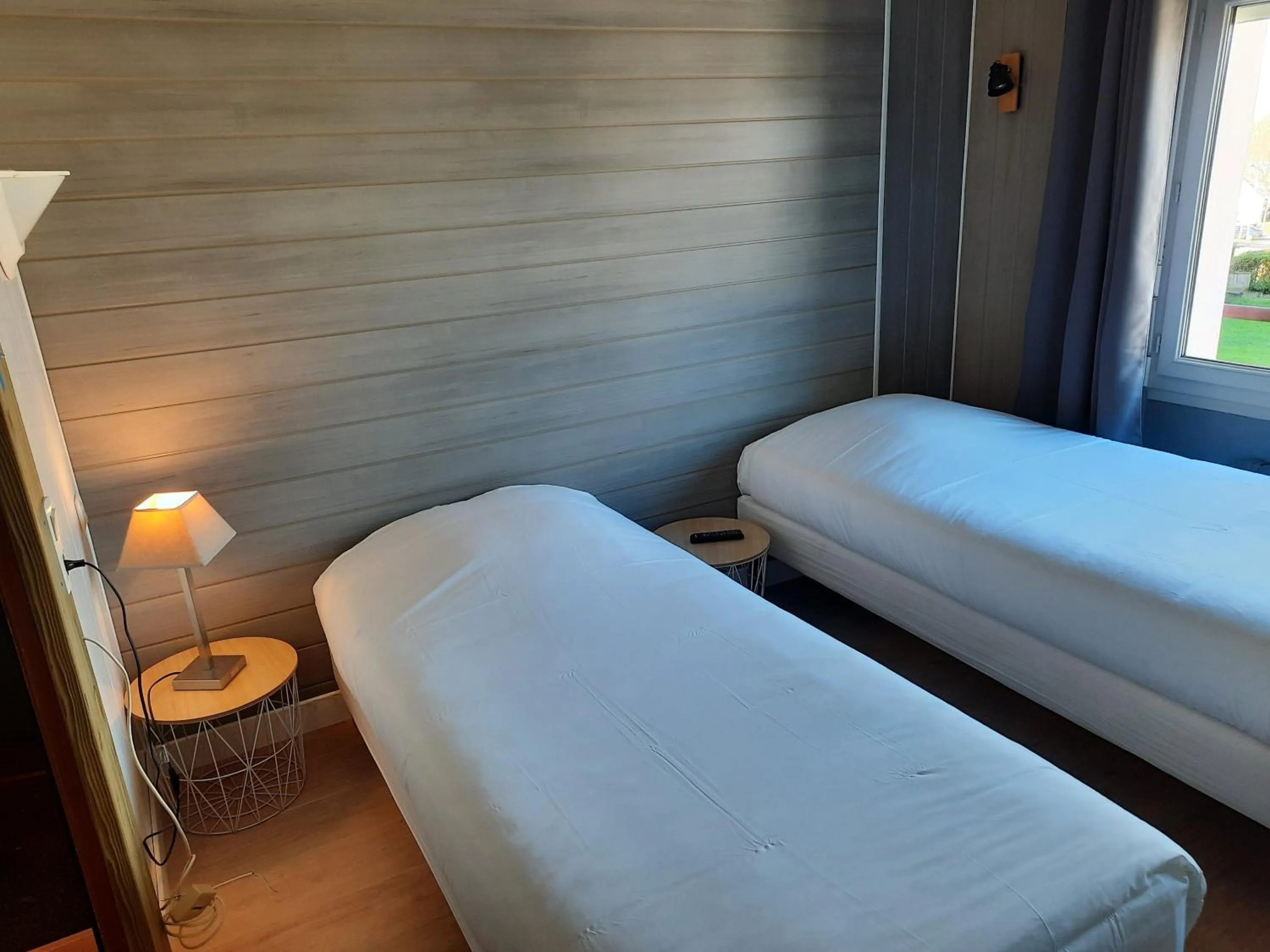 Bed in Hôtel des îles