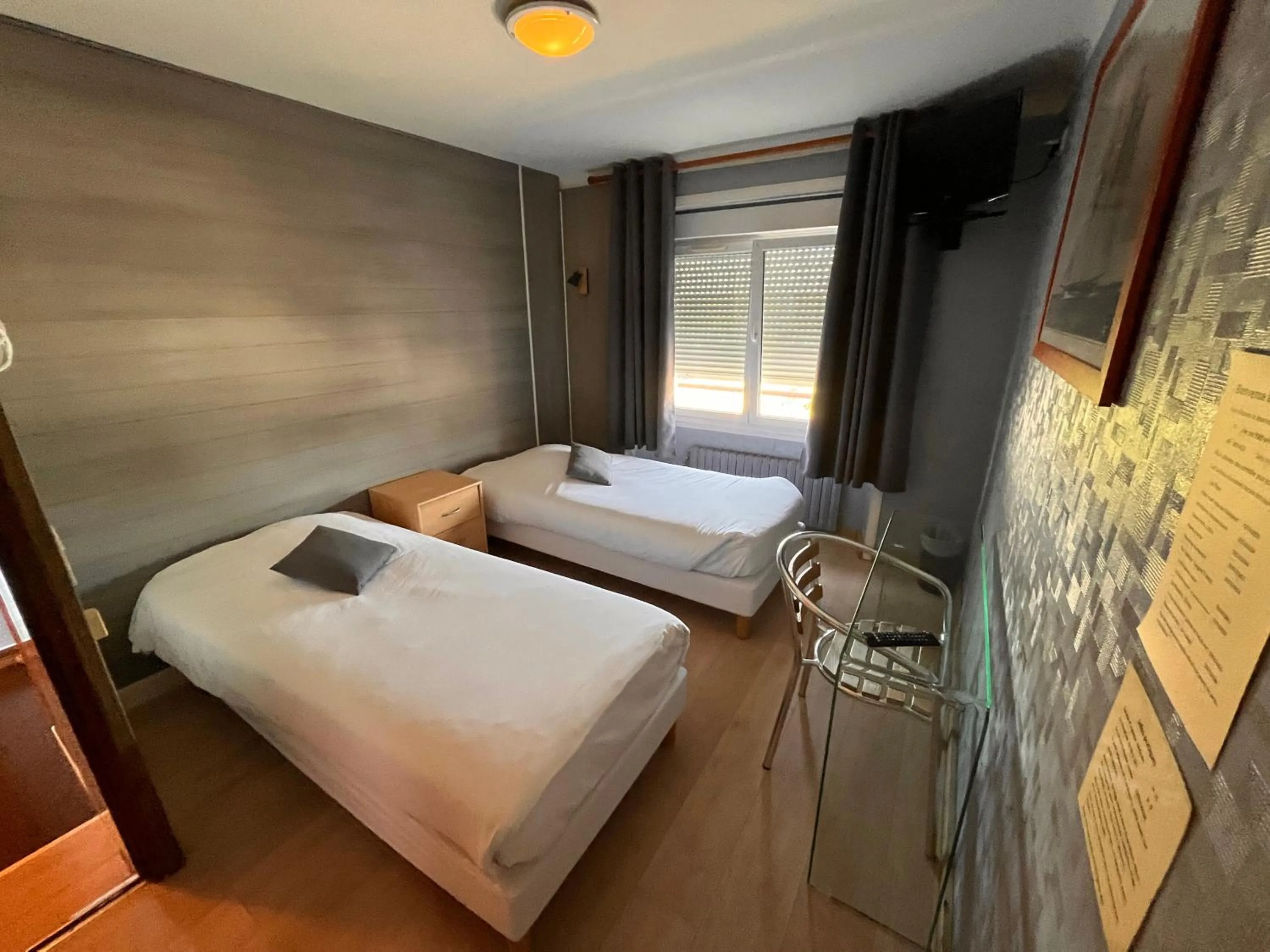 Bed in Hôtel des îles