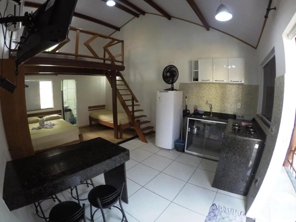 Kitchen or kitchenette, Bed in Recanto da Ilha