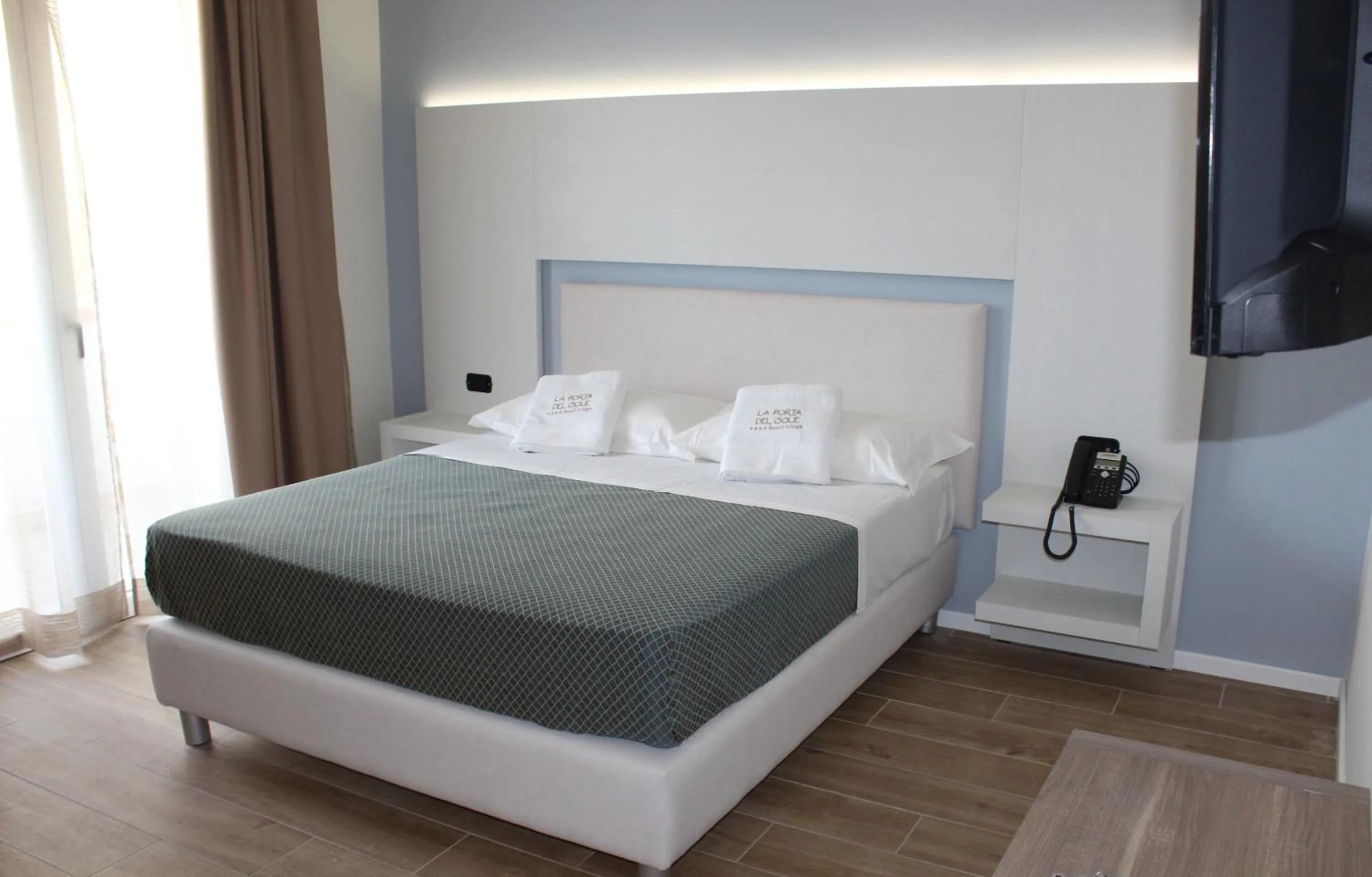 Bed in La Porta del Sole Hotel & Village