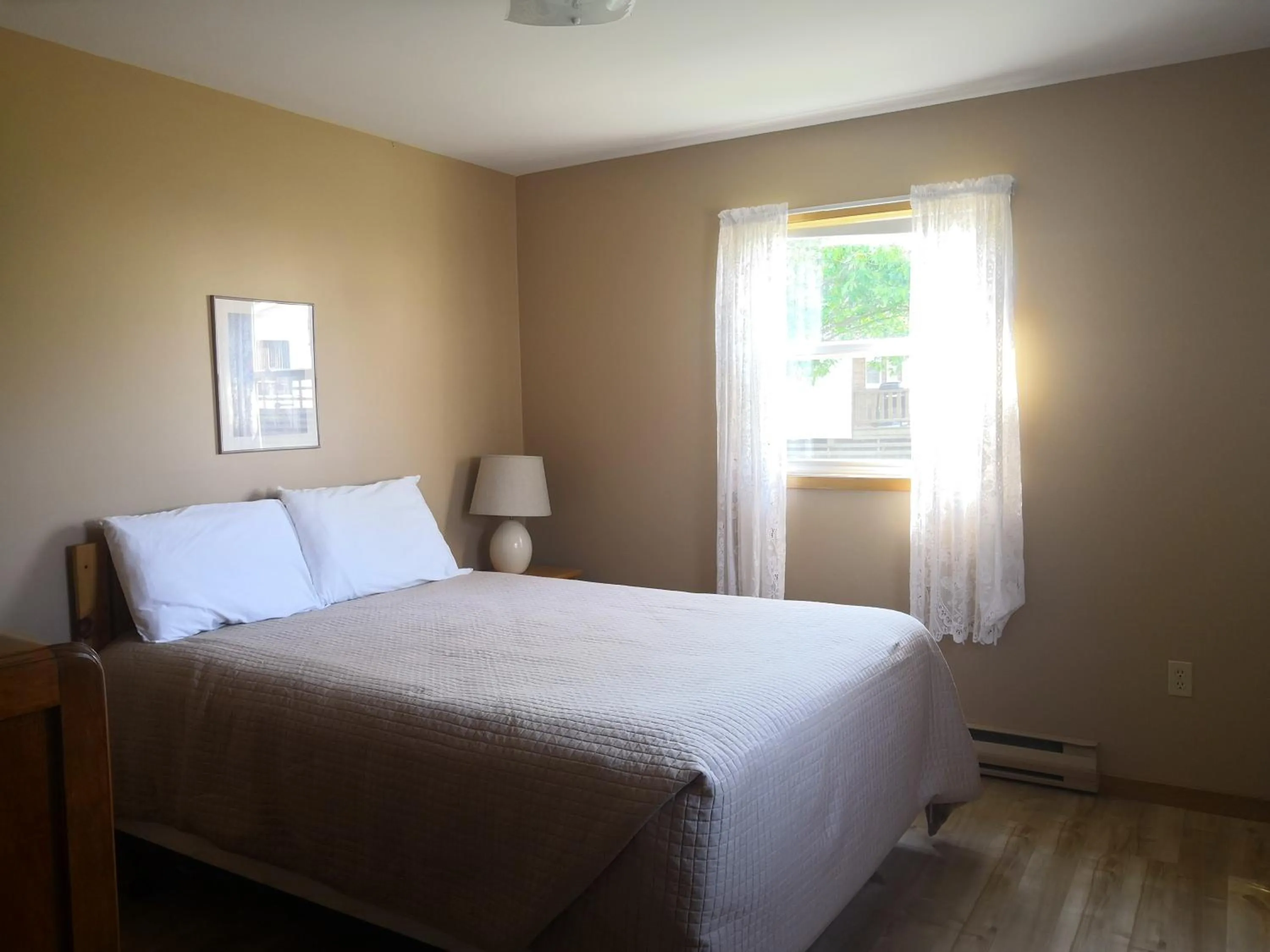 Bed in Cavendish Country Inn & Cottages