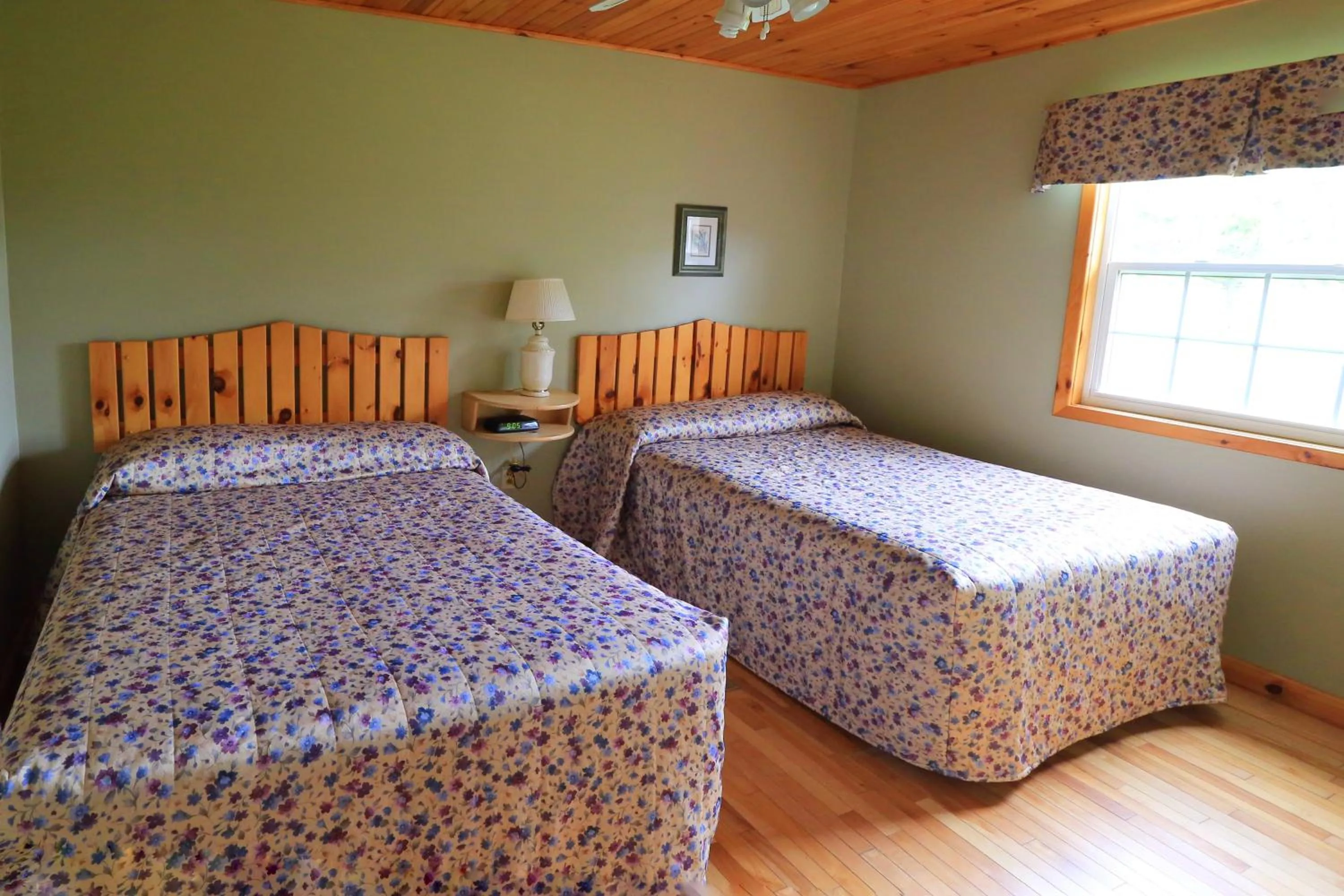 Bed in Cavendish Country Inn & Cottages