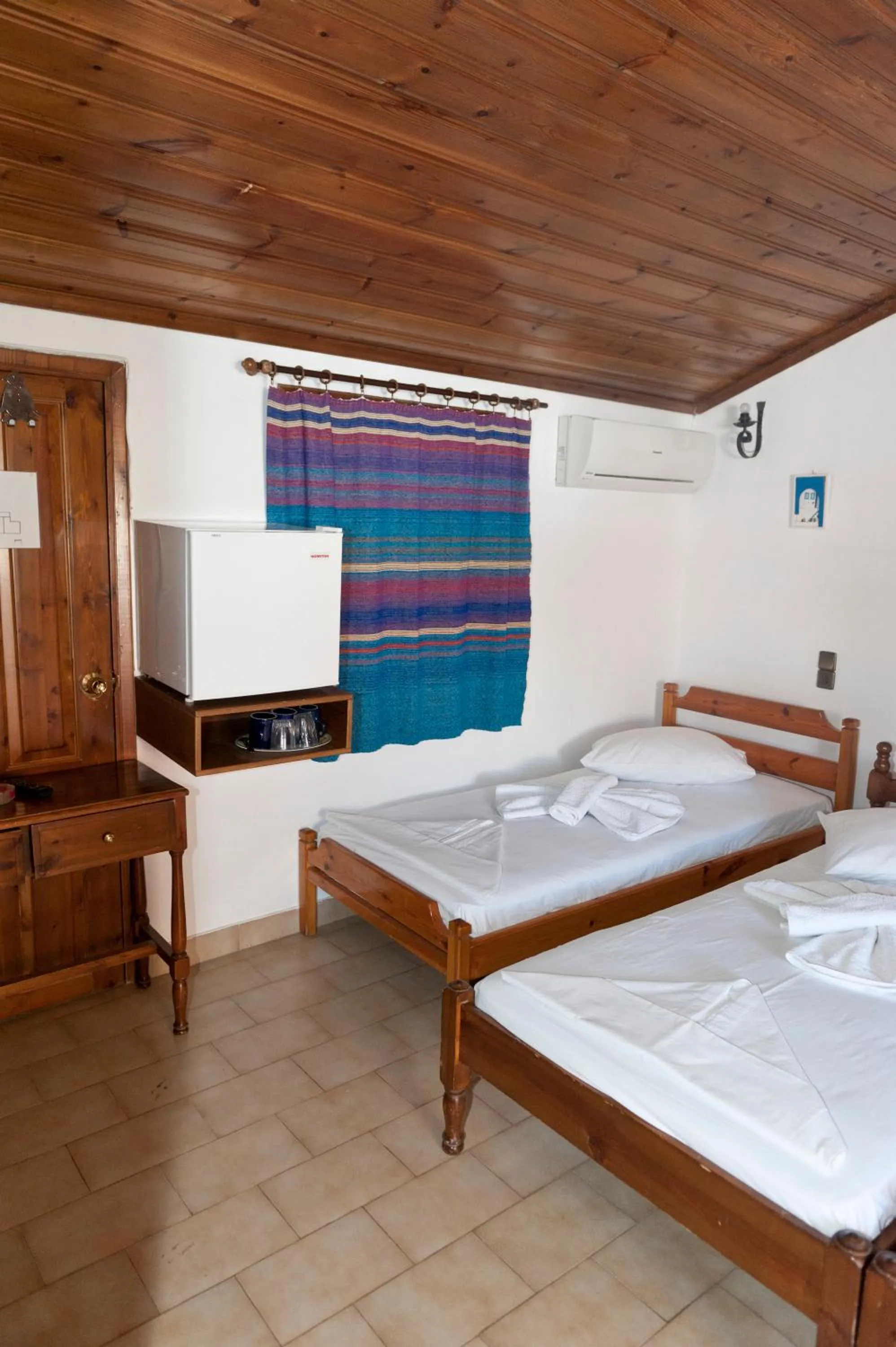 Bedroom in Pegasus Hotel