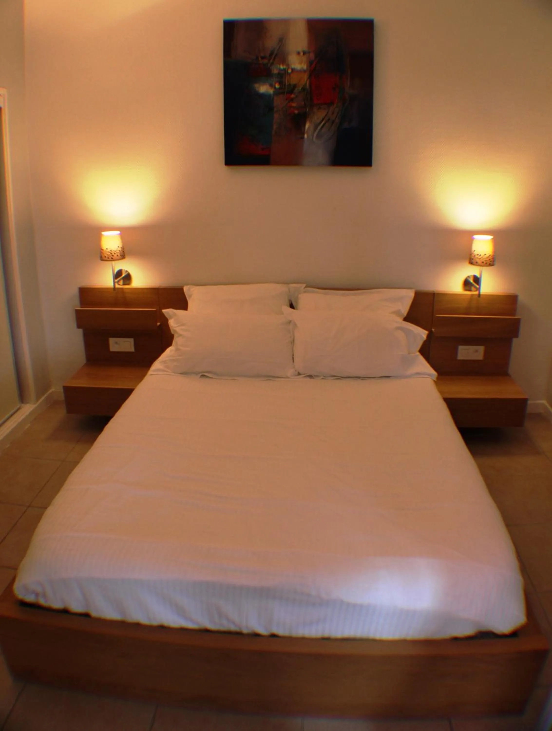 Bed in Hotel Les Hauts de Porto-Vecchio