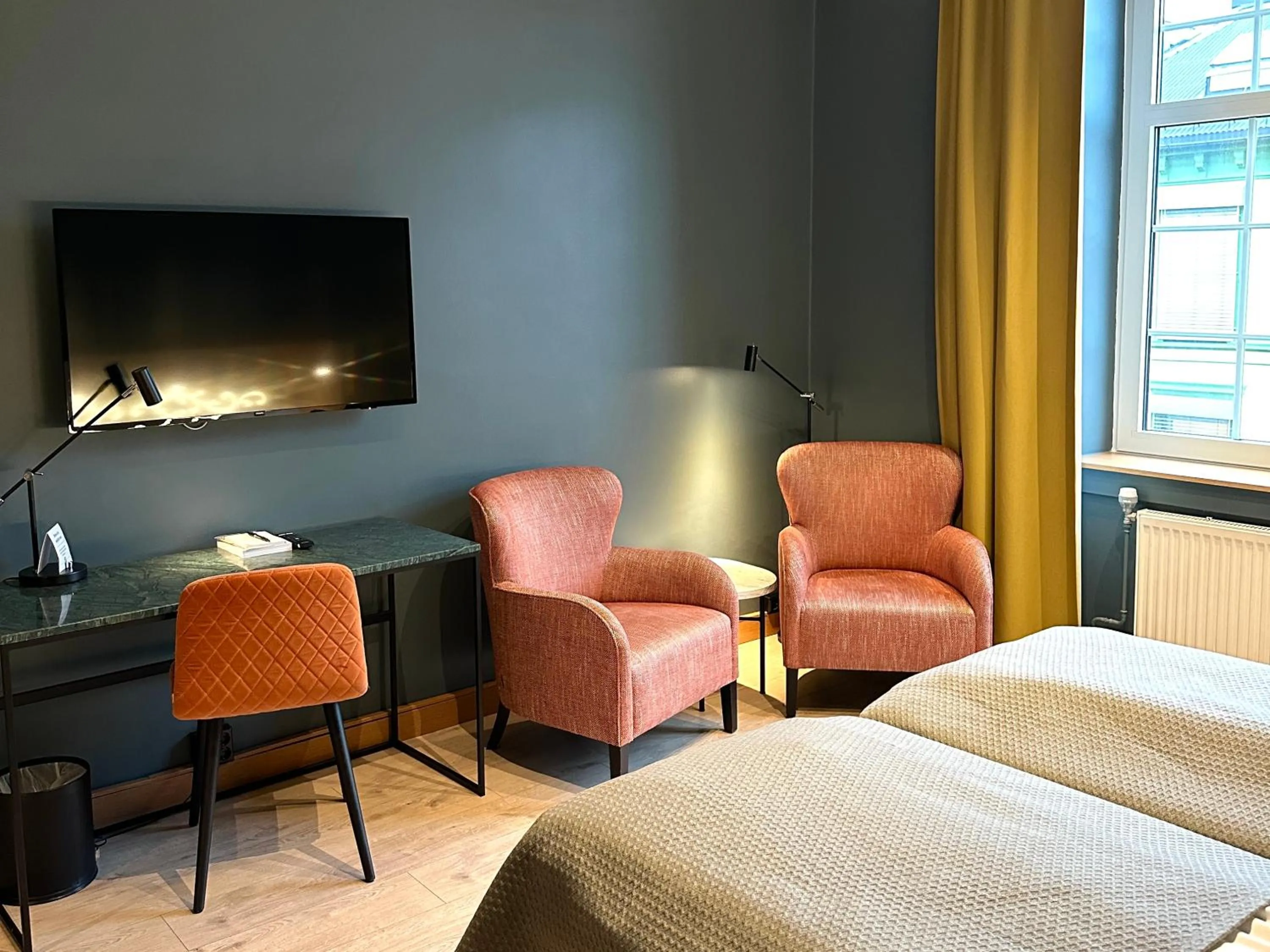 Seating area, Bed in Hotell Bondeheimen