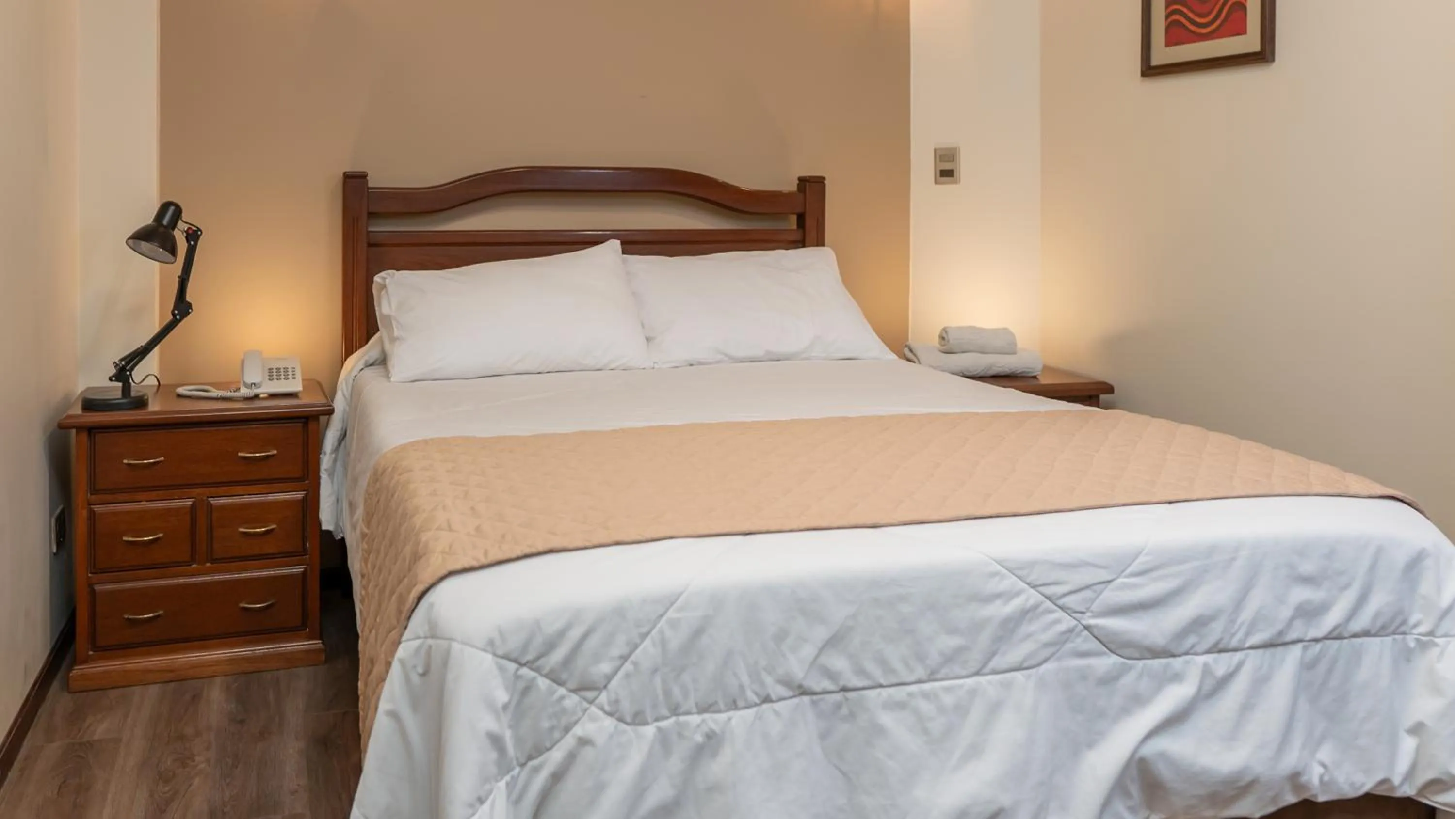 Bed in El Prado Hotel