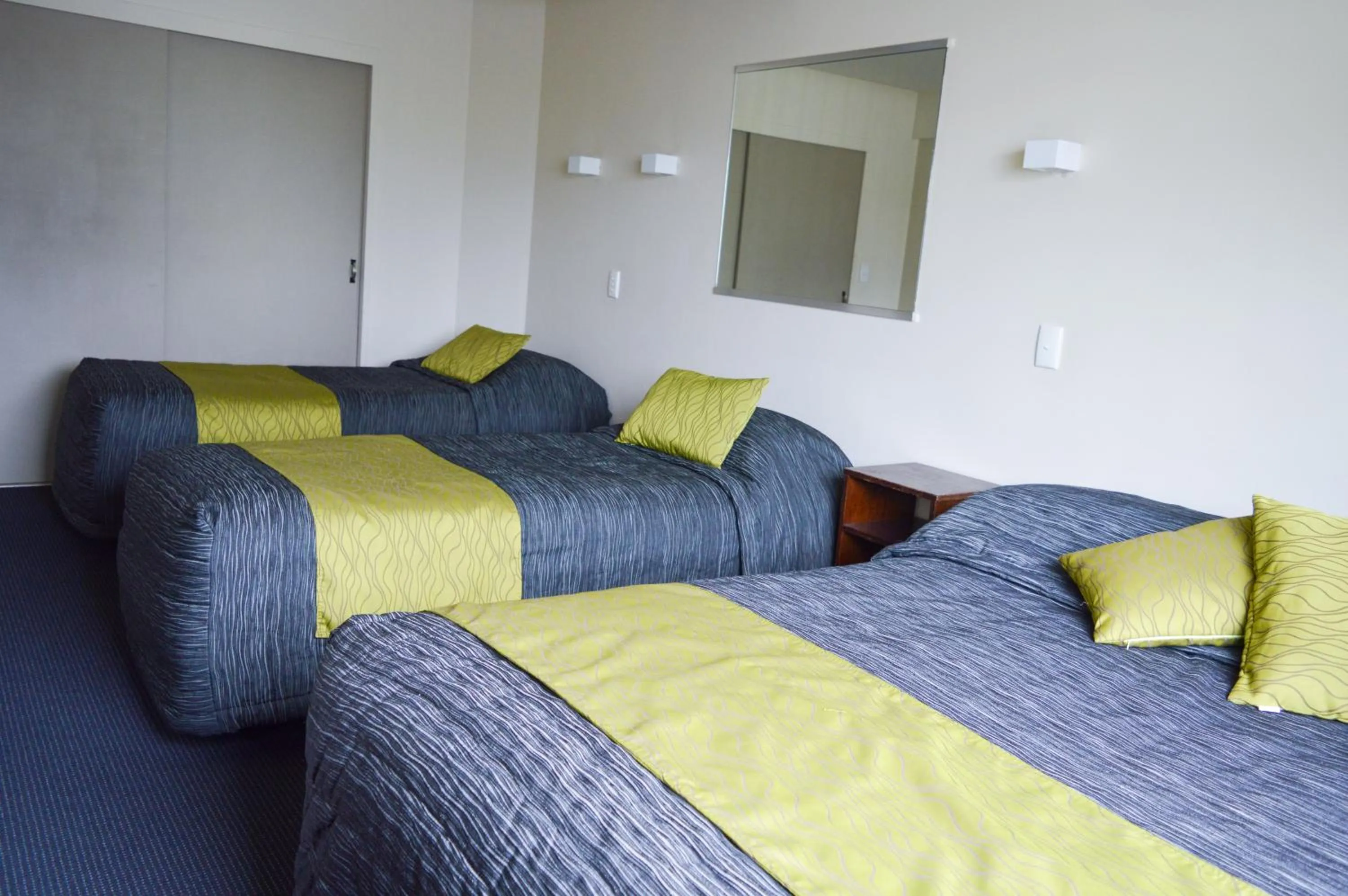 Bed in Four Seasons Motel