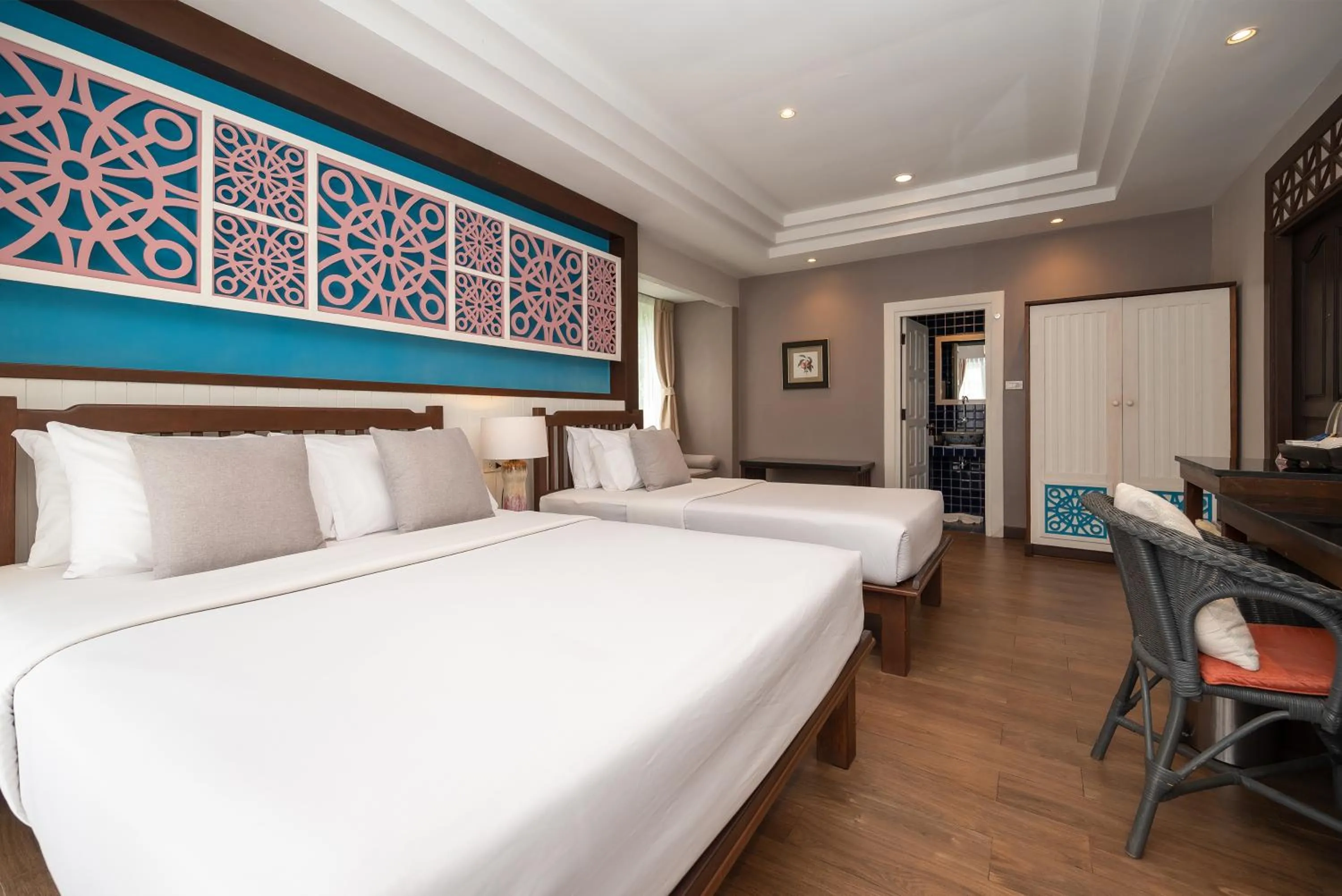 Bed in Le Charme Sukhothai Historical Park