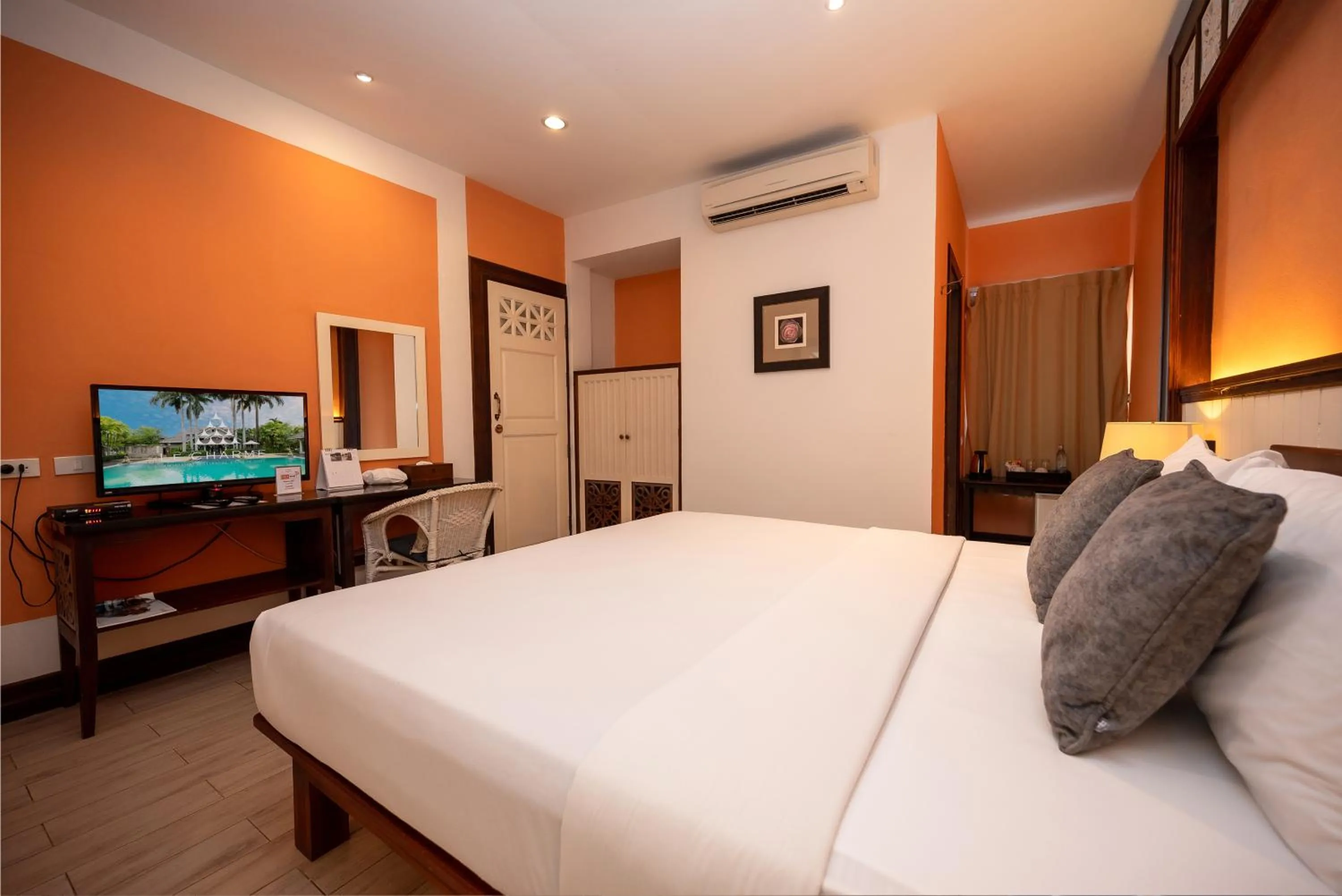 Bed in Le Charme Sukhothai Historical Park