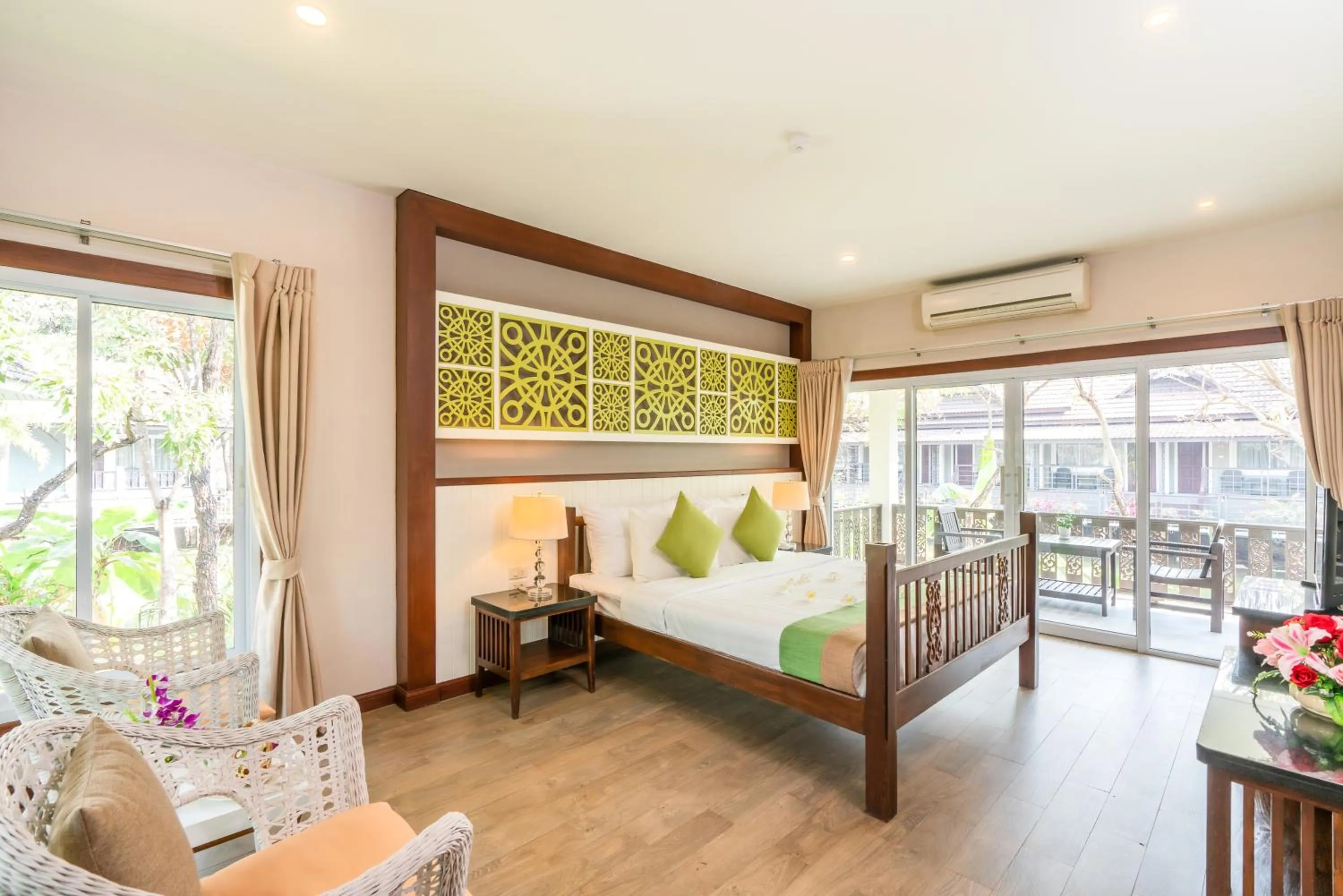 Bed in Le Charme Sukhothai Historical Park