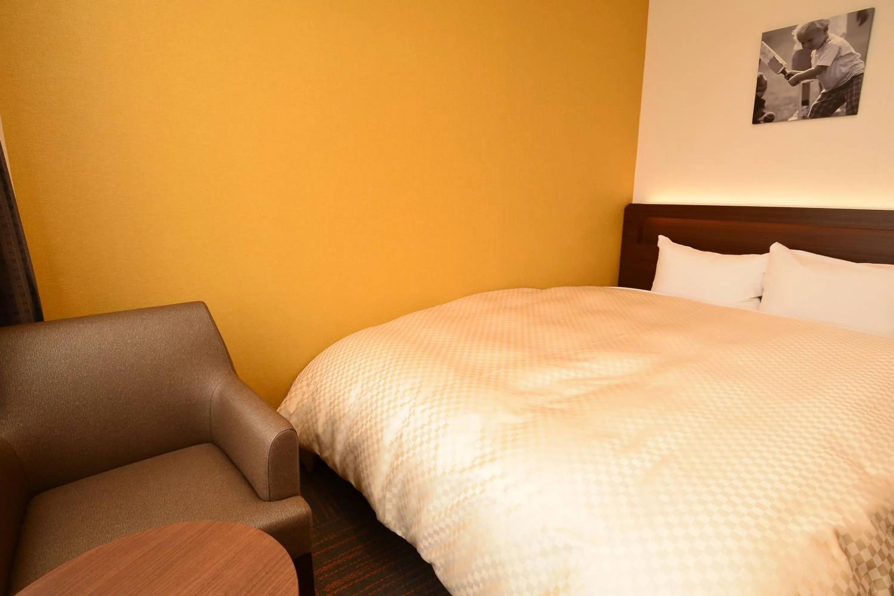 Bed in Hotel Sunroute Sano