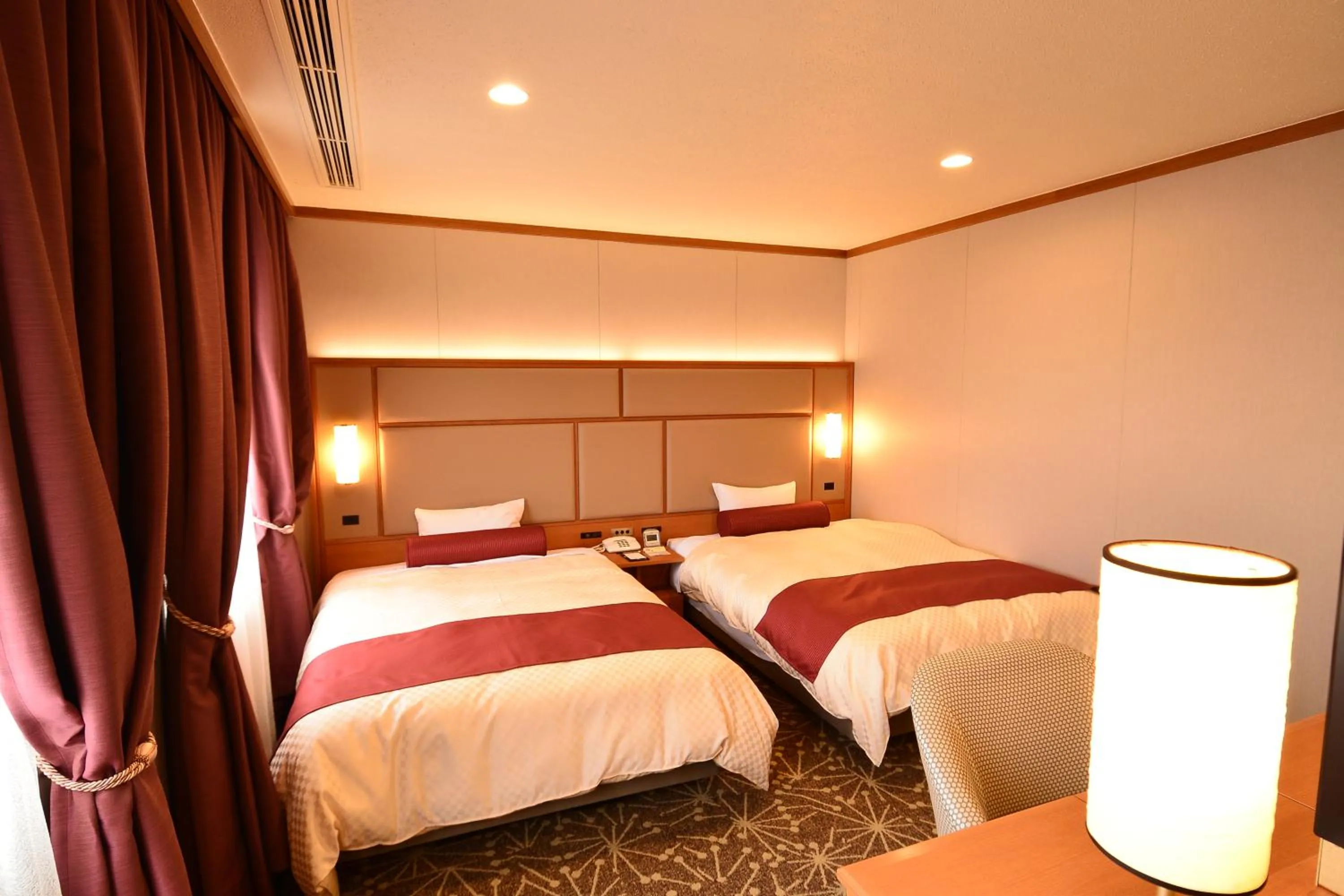 Bed in Hotel Sunroute Sano