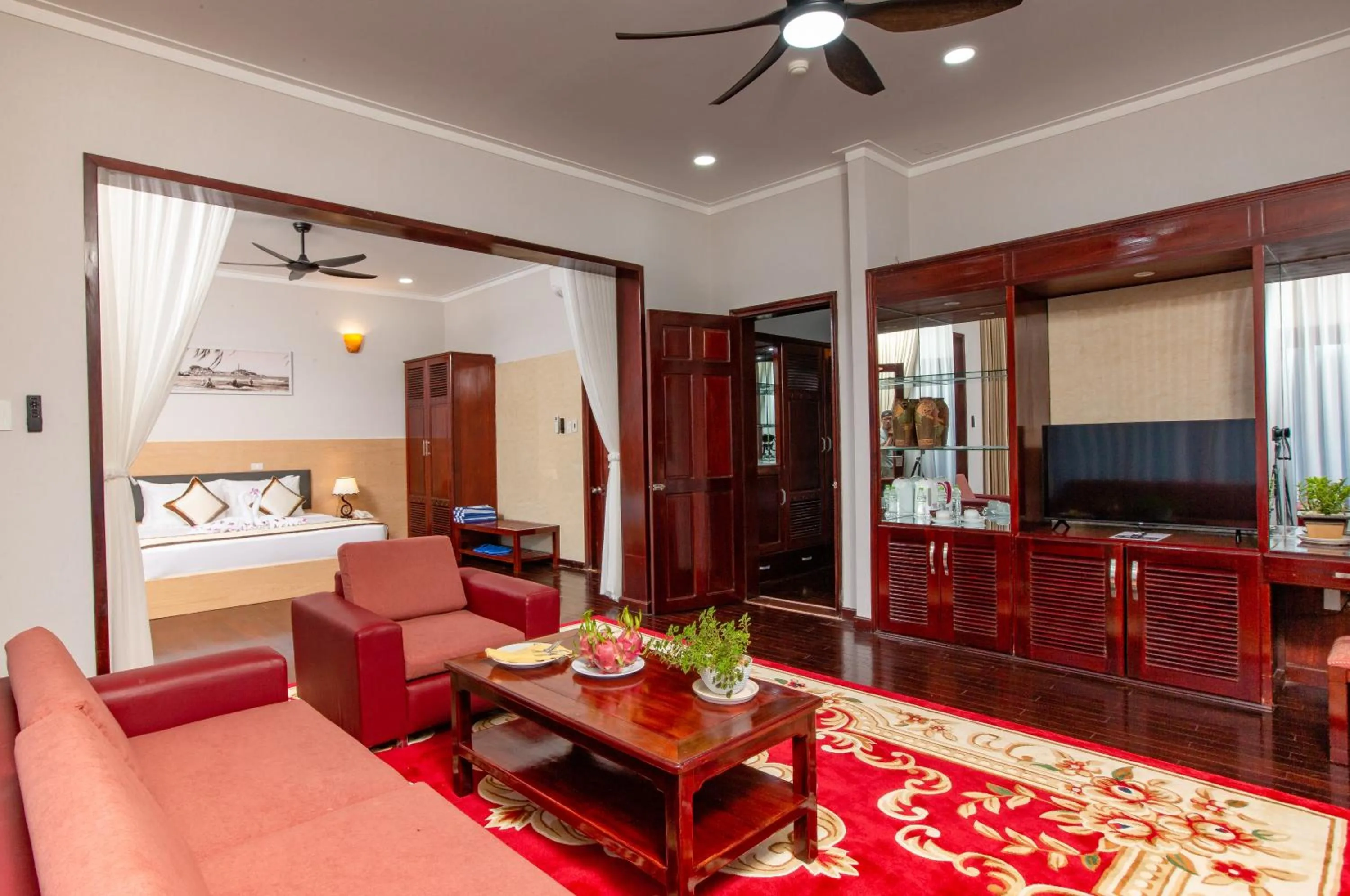 Living room, Bed in Golden Coast Resort & Spa