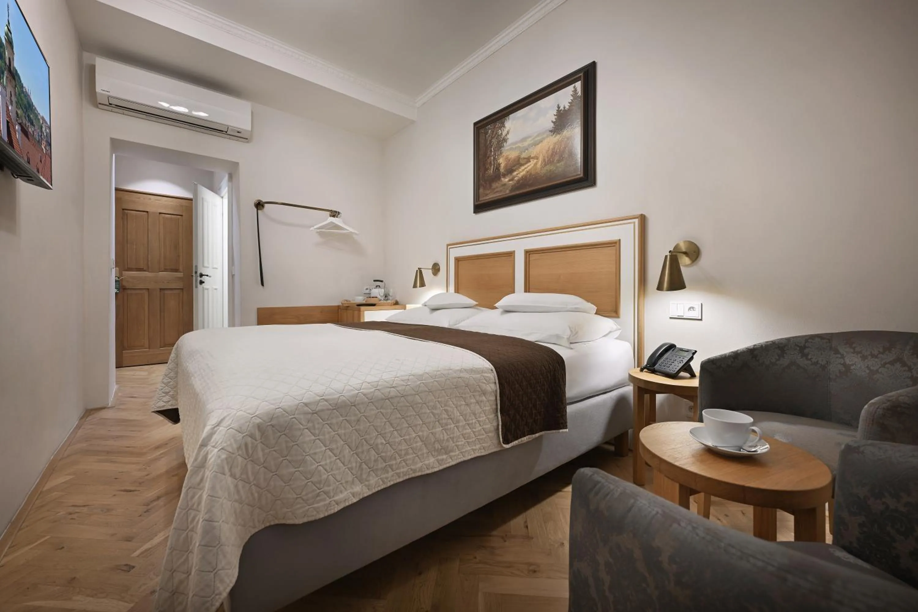 Bed in Hotel At the Golden Scissors