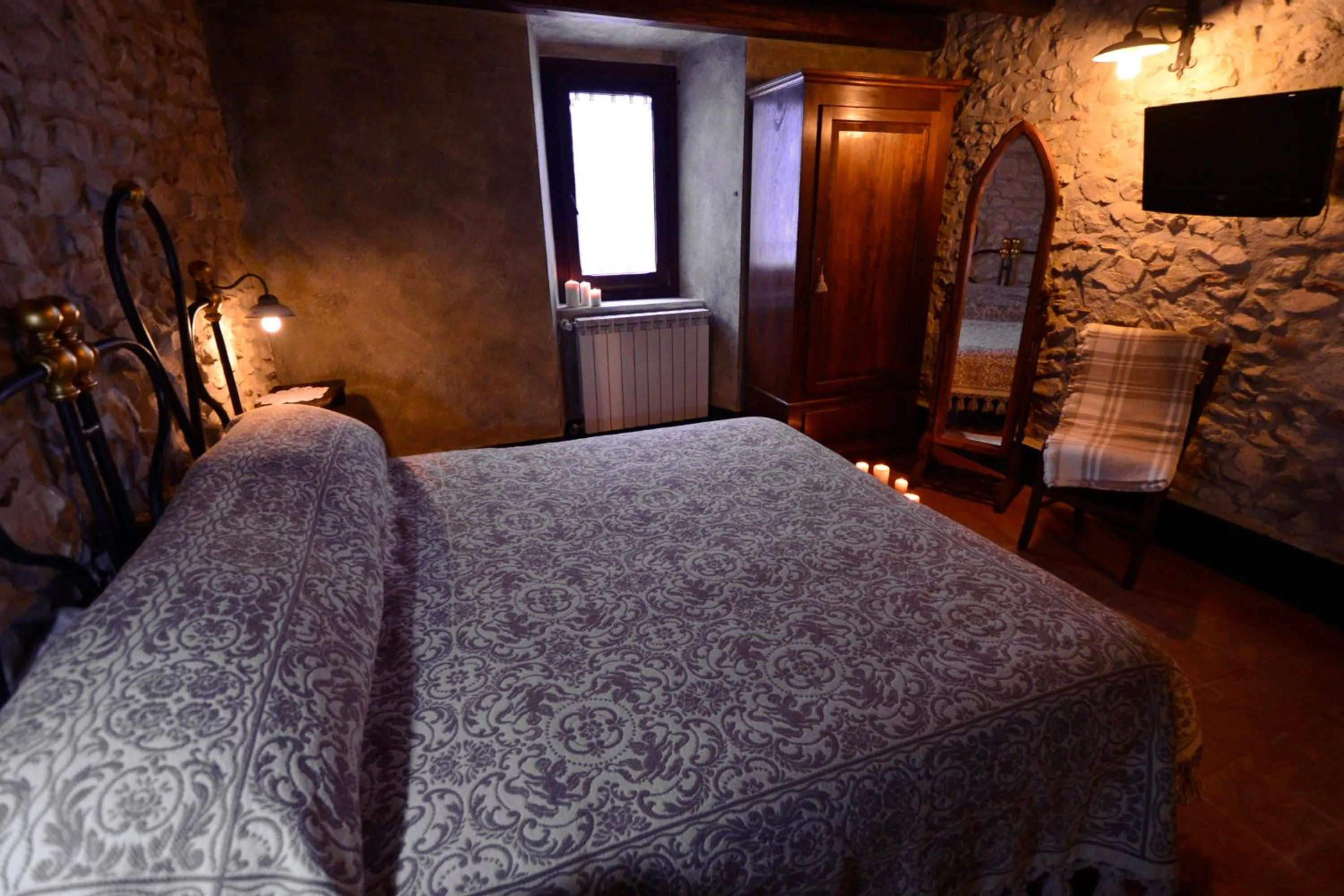 Bed in Robur Marsorum Albergo Diffuso